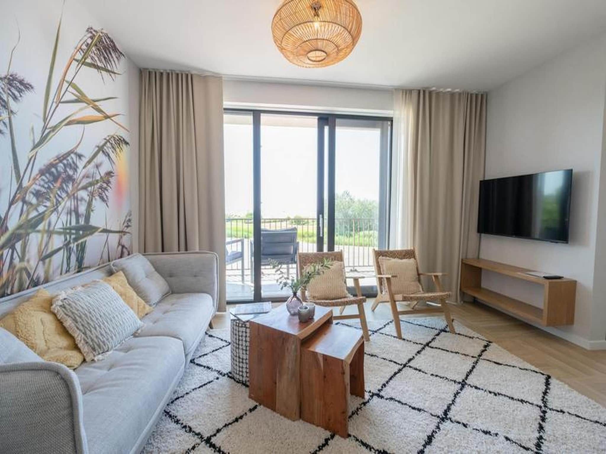 De woonkamer van Luxury Beach Apartment | 8 Pers. in Workum