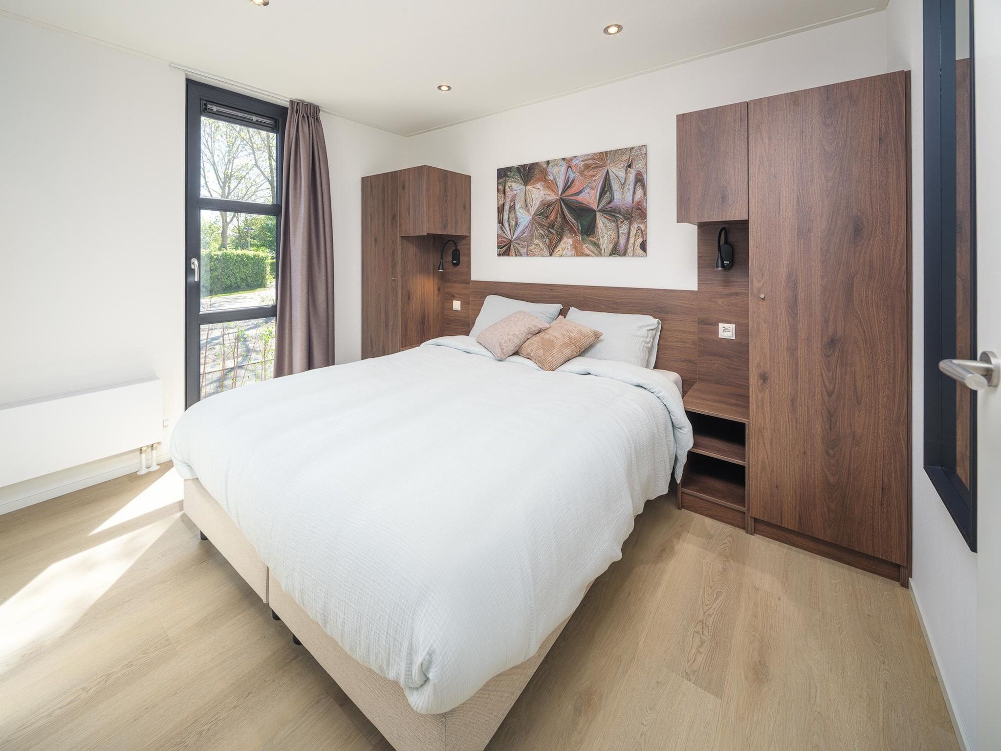 Een slaapkamer van Villa L-Meerzicht | 4 pers. Roof Terrace in Workum