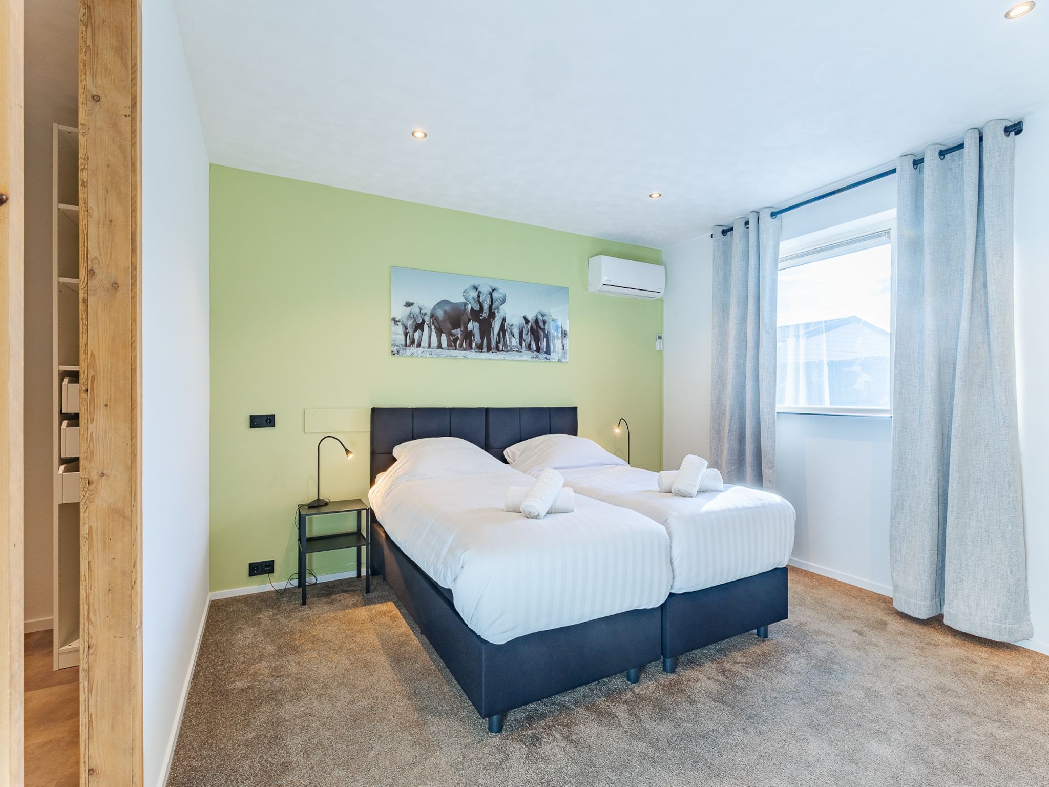 Een slaapkamer van Vakantiehuis - Keetenweg 10| Stavenisse in Stavenisse