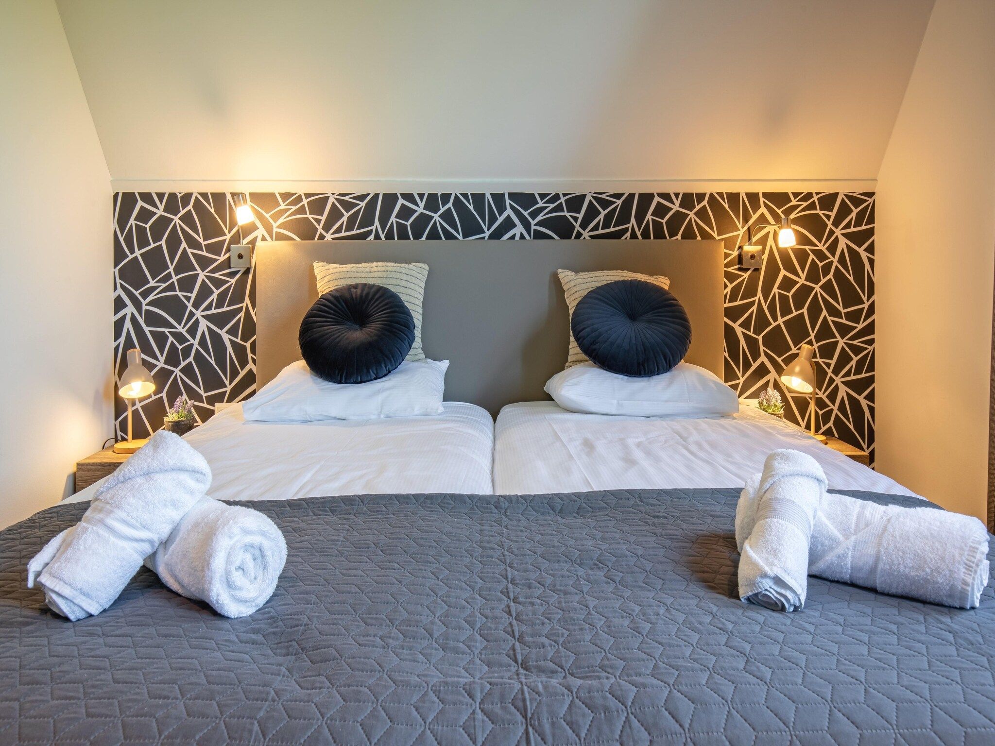 Een slaapkamer van De Witte Parel in Den Burg