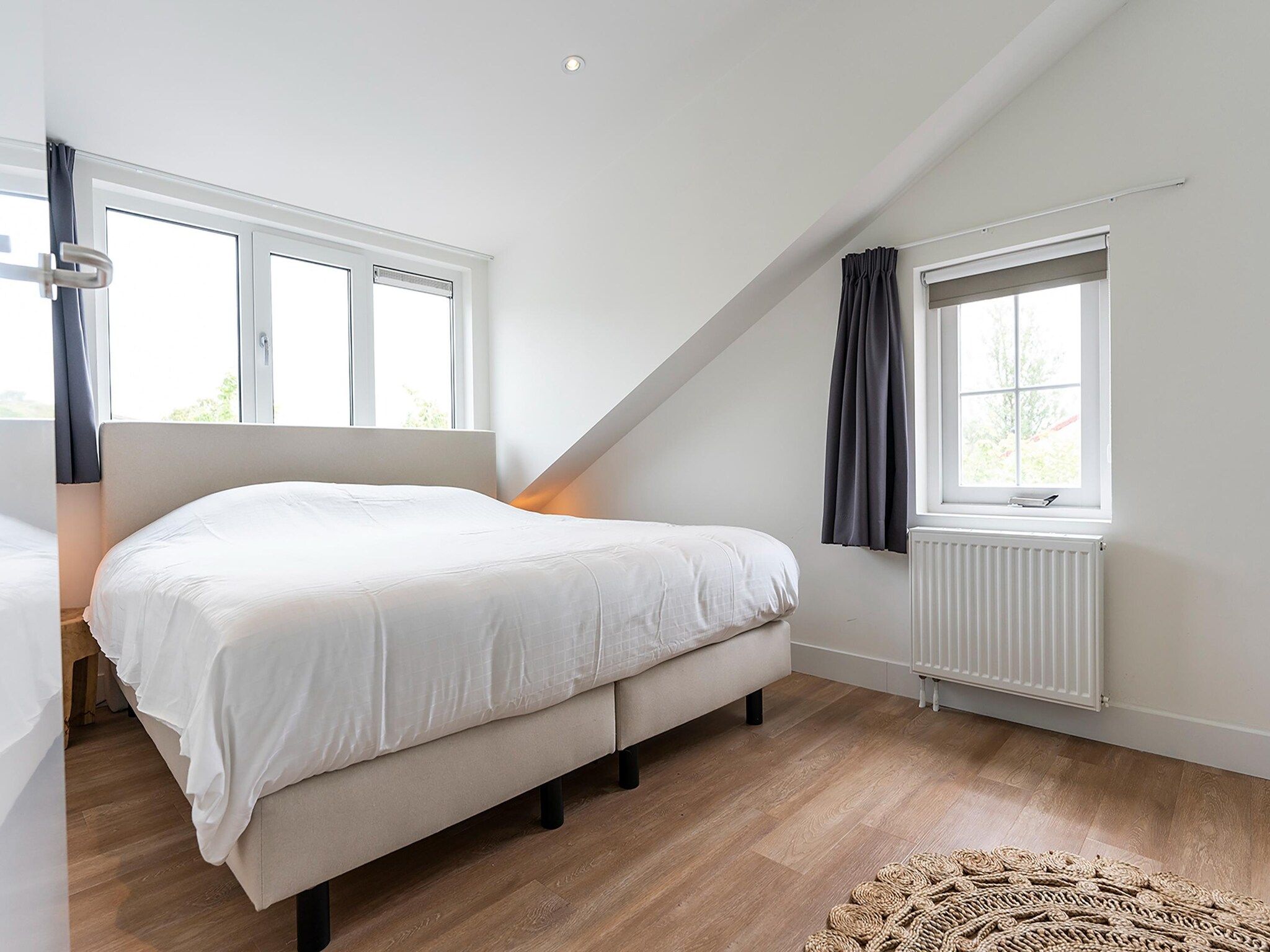 Een slaapkamer van Noorderlicht in De Cocksdorp