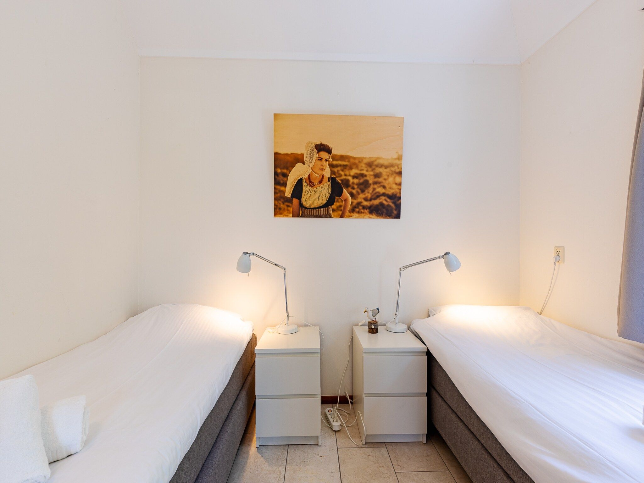 Een slaapkamer van Vakantiewoning - Westduin 6 I Vlissingen 'Zilt en zand' in Vlissingen