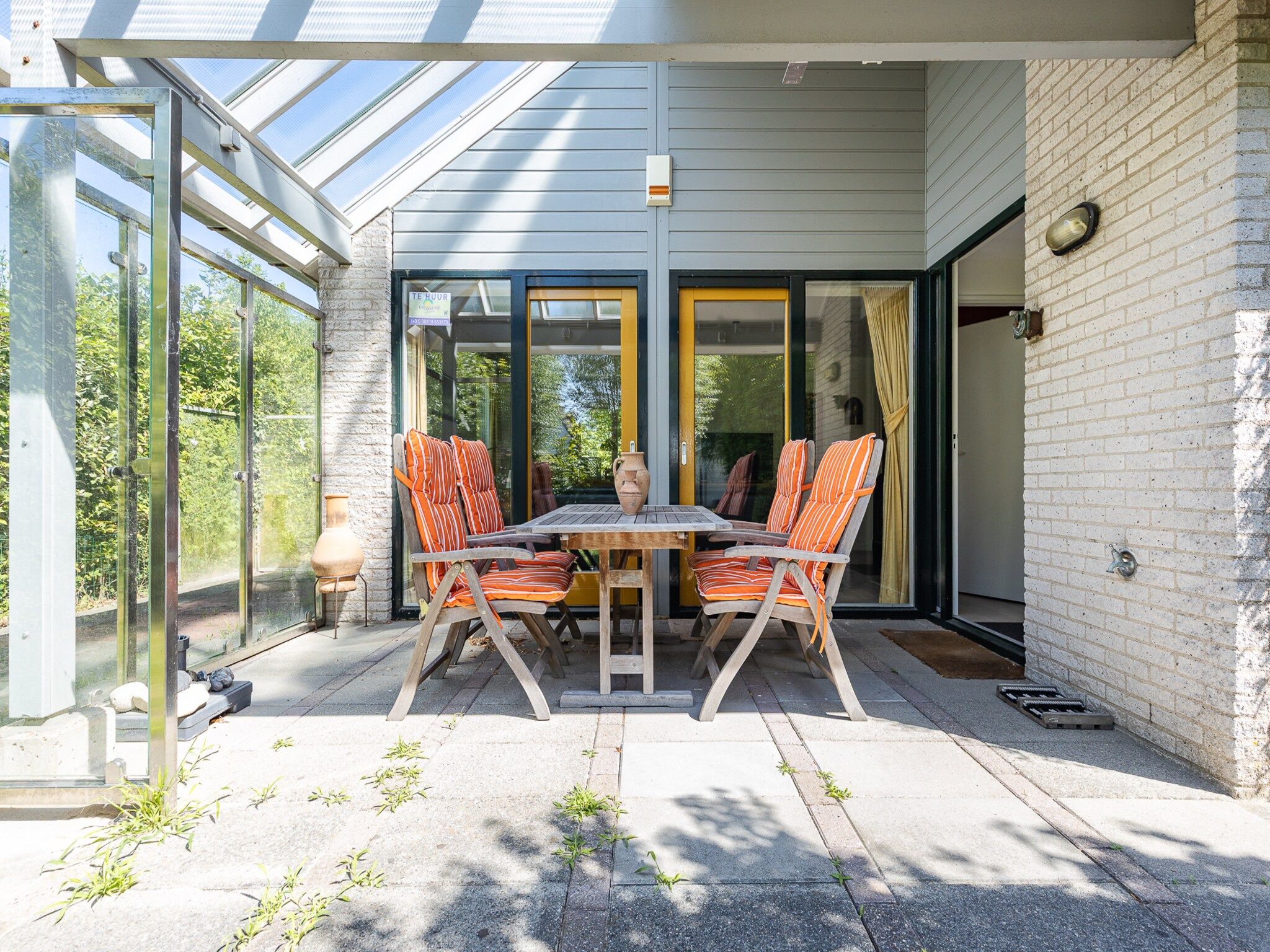 Het terras van Vakantiewoning - Westduin 6 I Vlissingen 'Zilt en zand' in Vlissingen