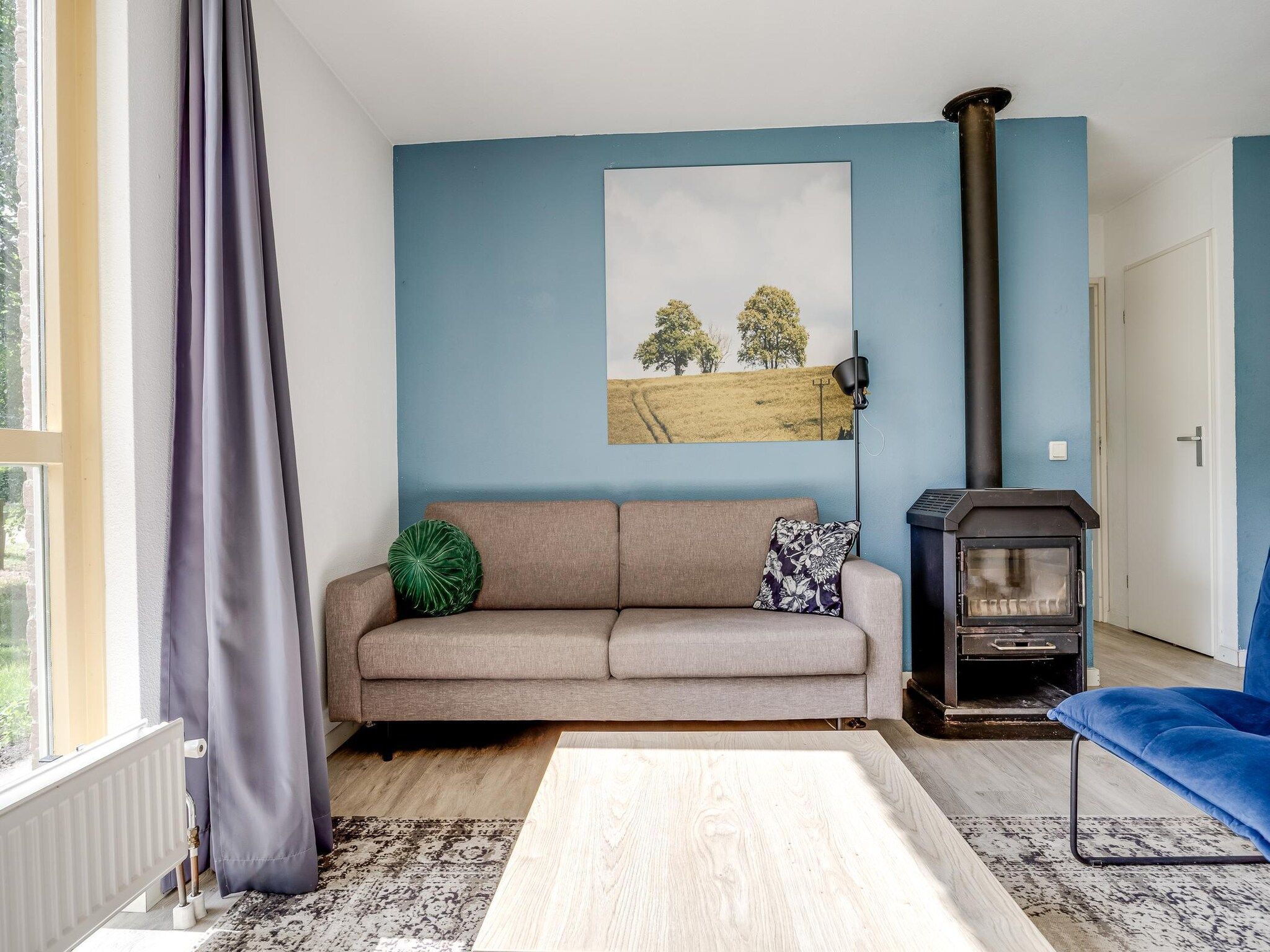 De woonkamer van 7 - Persoons Forest 217 Sauna Bungalow (copy) in Ewijk