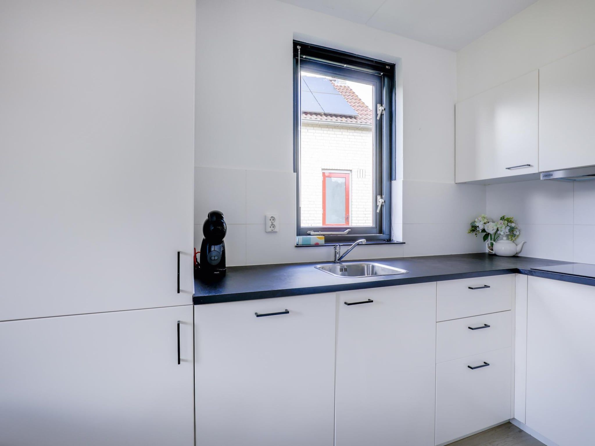 De keuken van 7 - Persoons Forest 217 Sauna Bungalow (copy) (copy) in Ewijk