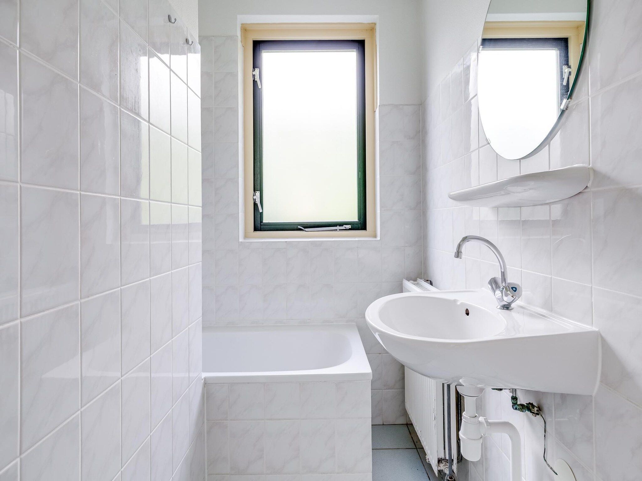 De badkamer van 7 - Persoons Forest 217 Sauna Bungalow (copy) (copy) in Ewijk