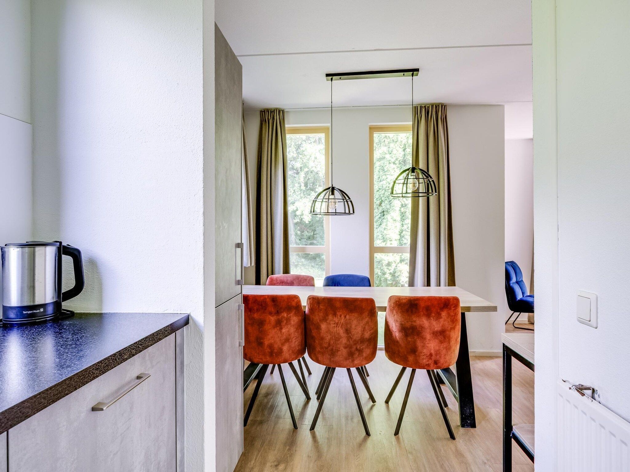 De eetkamer van 7 - Persoons Forest 217 Sauna Bungalow (copy) (copy) in Ewijk