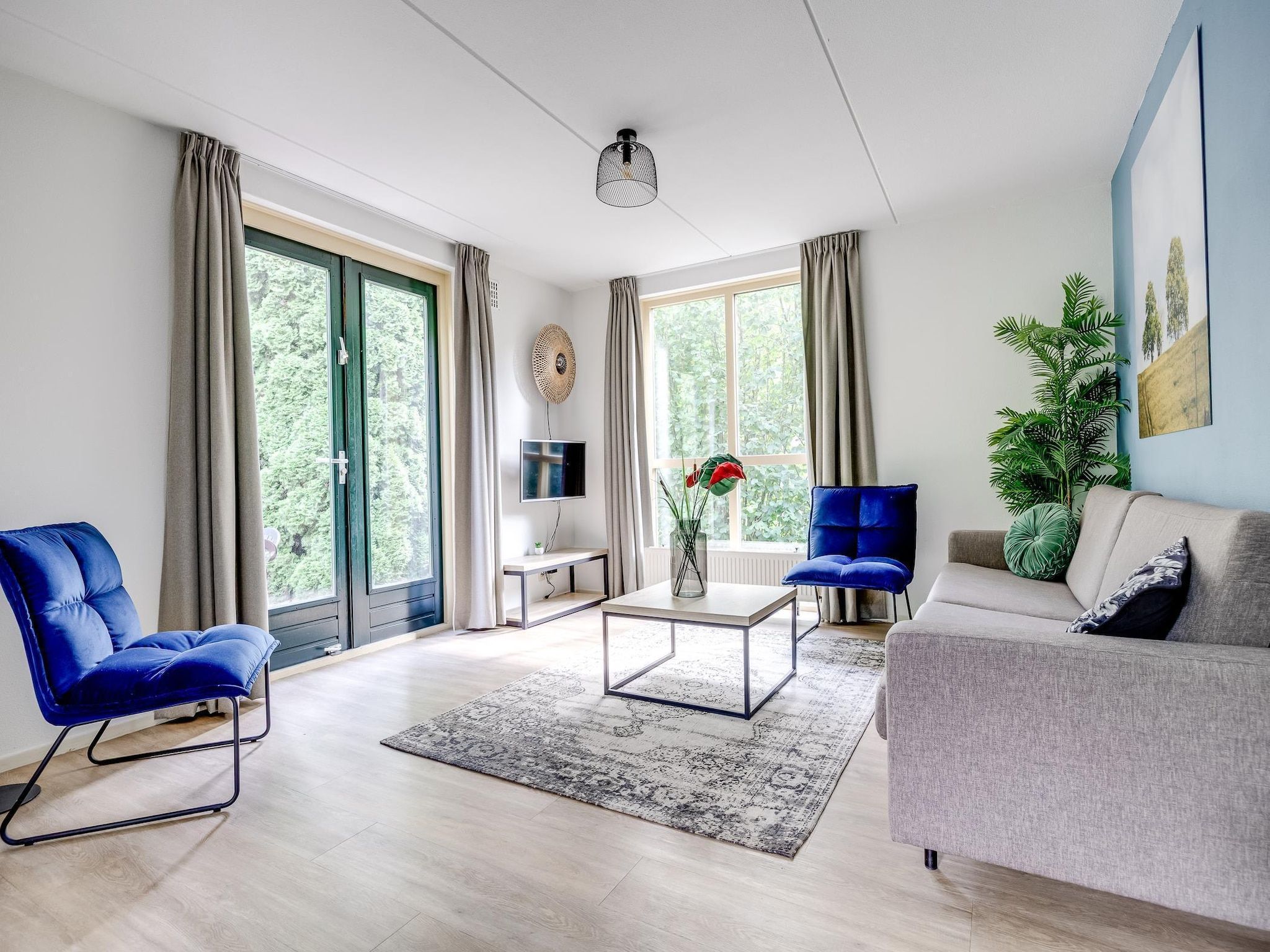 De woonkamer van 7 - Persoons Forest 217 Sauna Bungalow (copy) (copy) in Ewijk