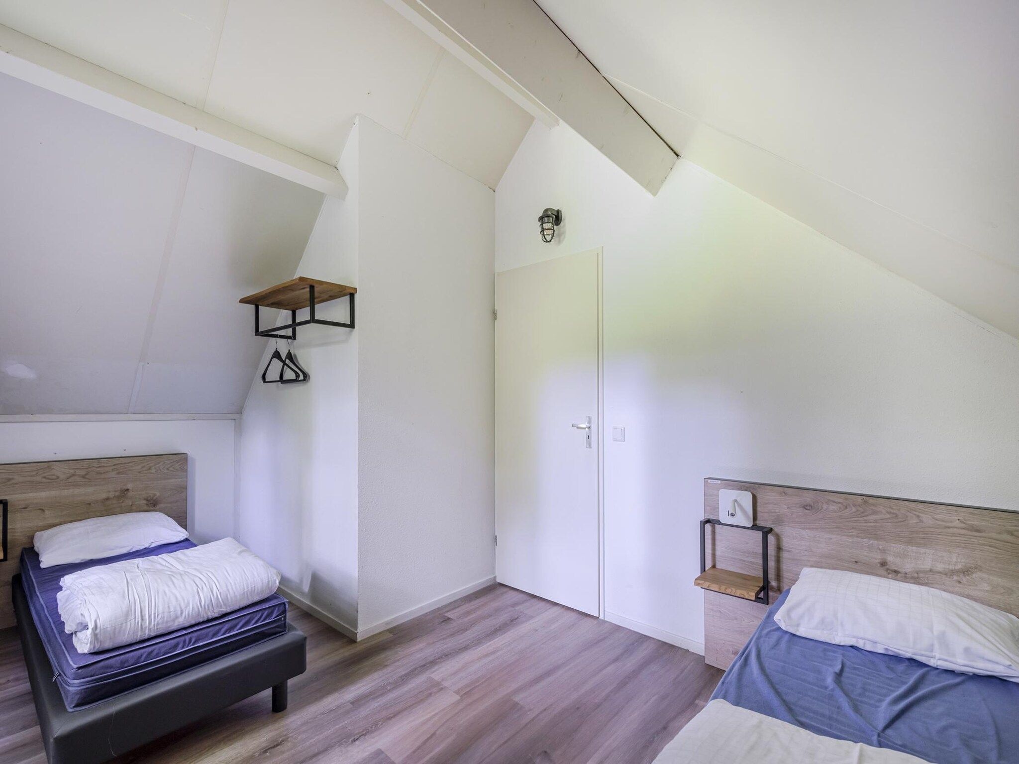 Een slaapkamer van 6 - Persons De Zingende Wilg (copy) (copy) in Ewijk