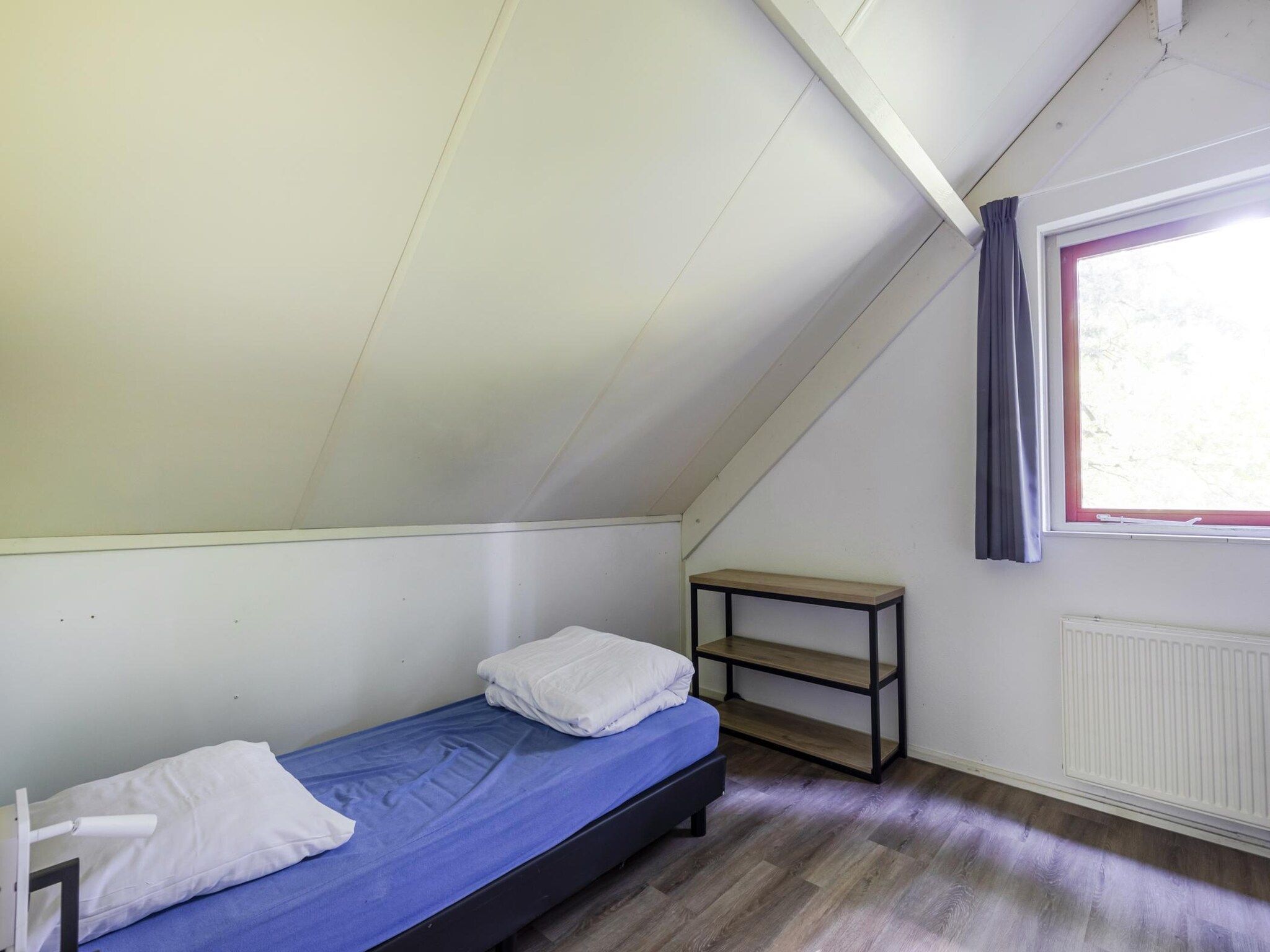 Een slaapkamer van 6 - Persons De Zingende Wilg (copy) (copy) in Ewijk