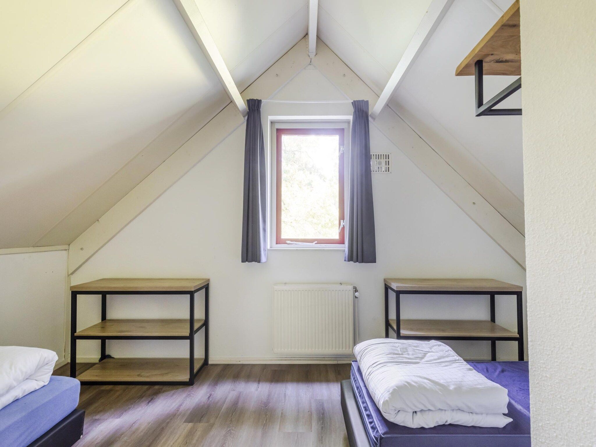 Een slaapkamer van 6 - Persons De Zingende Wilg (copy) (copy) in Ewijk