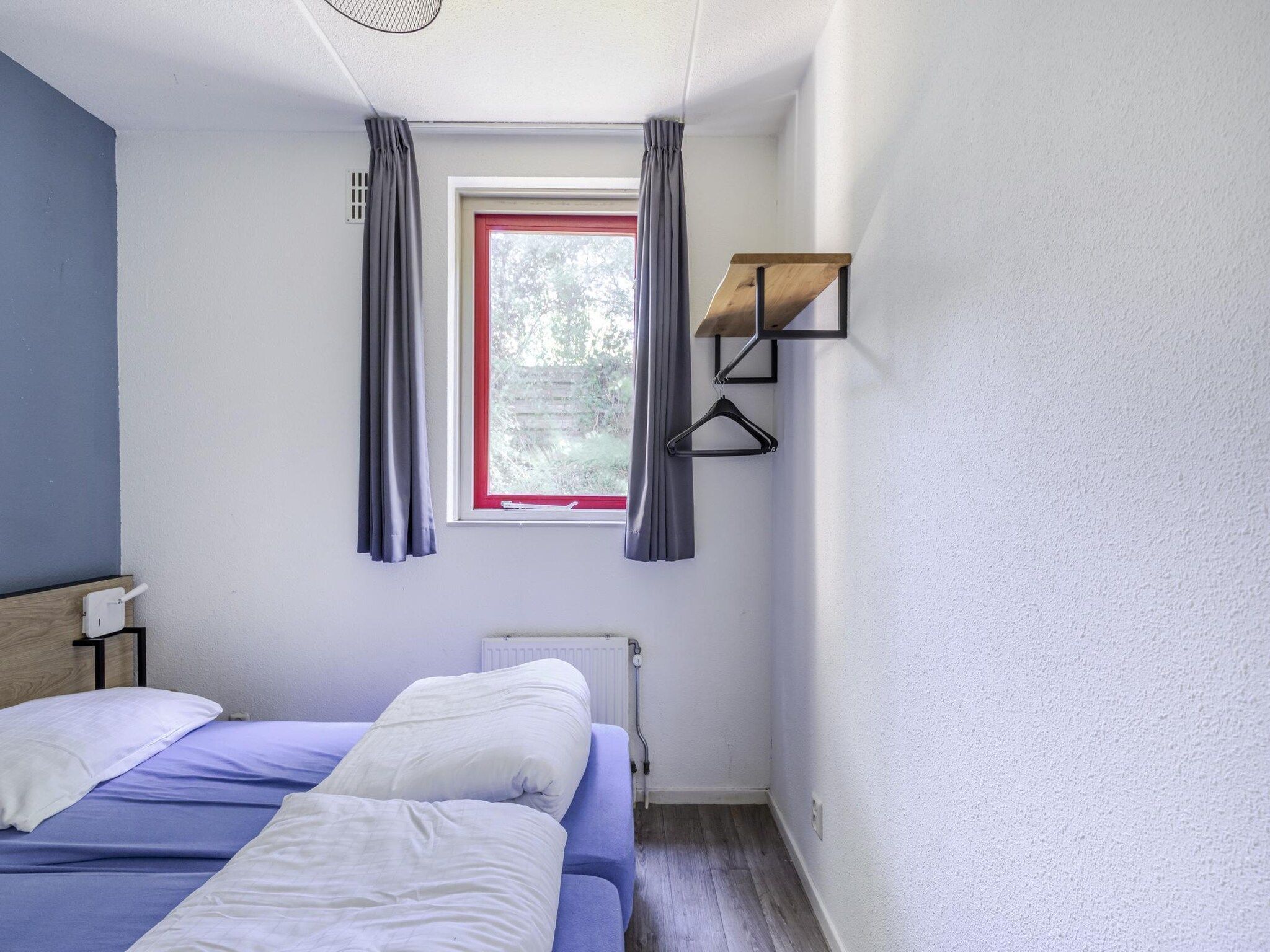 Een slaapkamer van 6 - Persons De Zingende Wilg (copy) (copy) in Ewijk