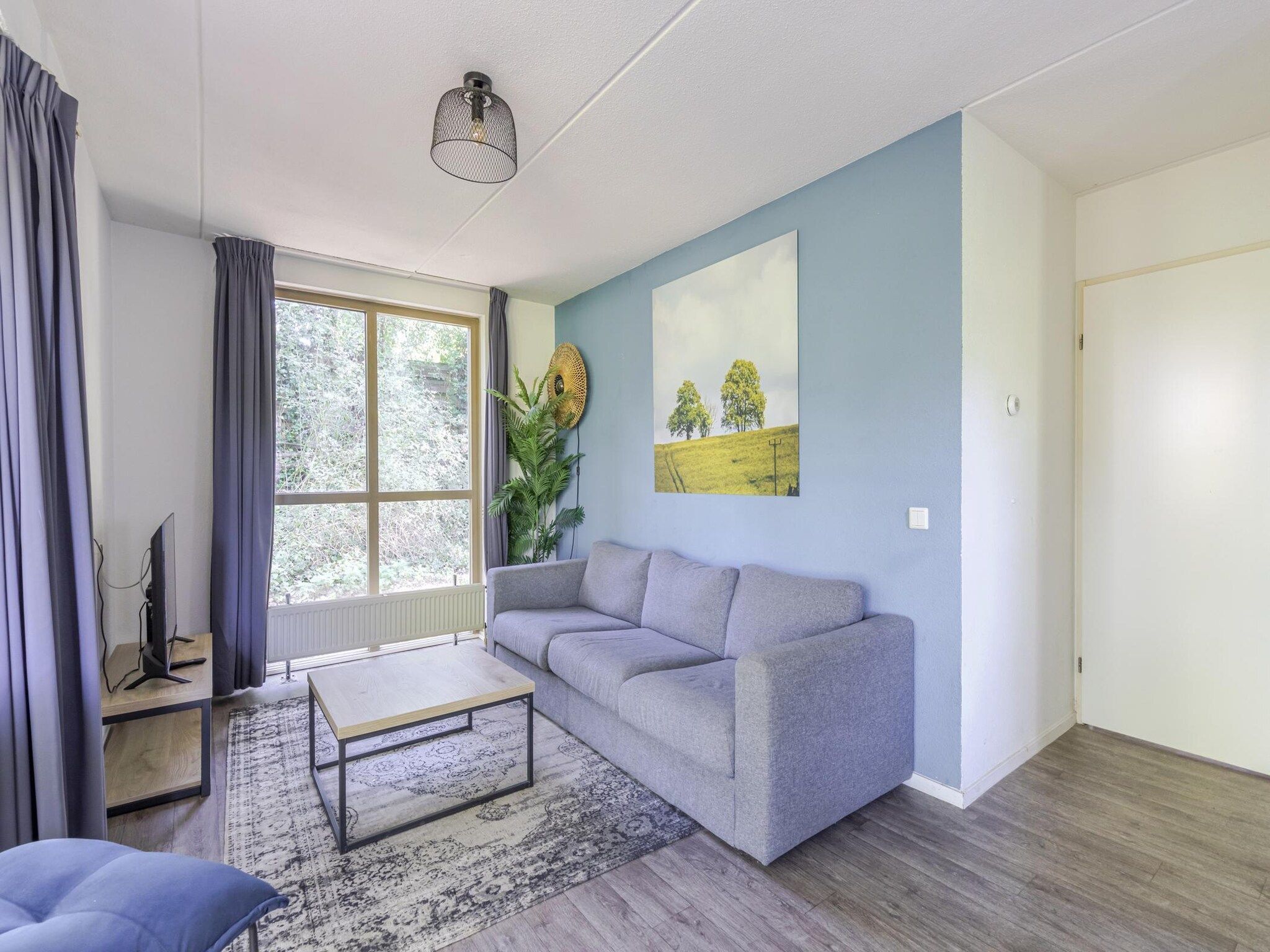 De woonkamer van 6 - Persons De Zingende Wilg (copy) (copy) in Ewijk