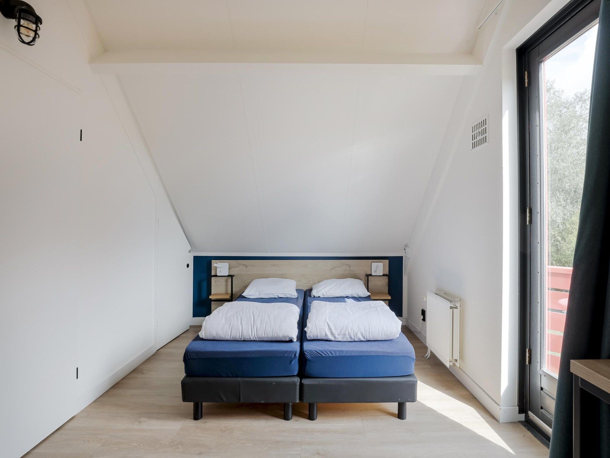 Een slaapkamer van 6 - Persons De Zingende Wilg (copy) (copy) in Ewijk