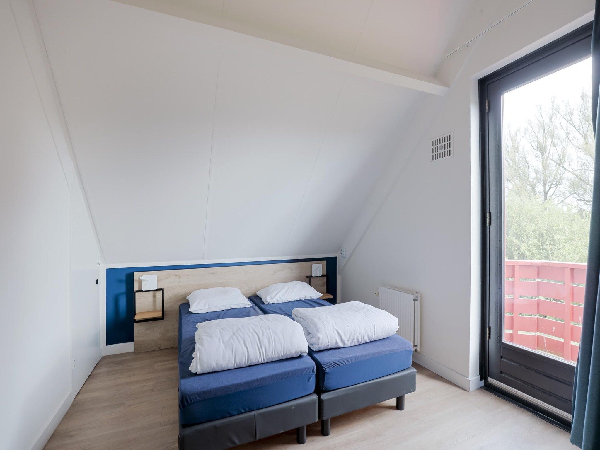 Een slaapkamer van 6 - Persons De Zingende Wilg (copy) (copy) in Ewijk