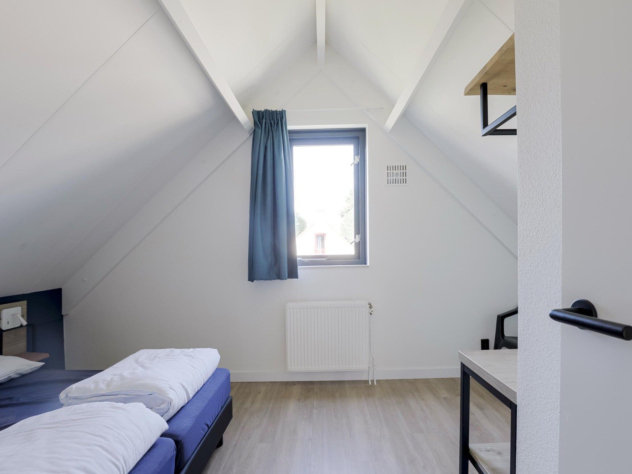 Een slaapkamer van 6 - Persons De Zingende Wilg (copy) (copy) in Ewijk