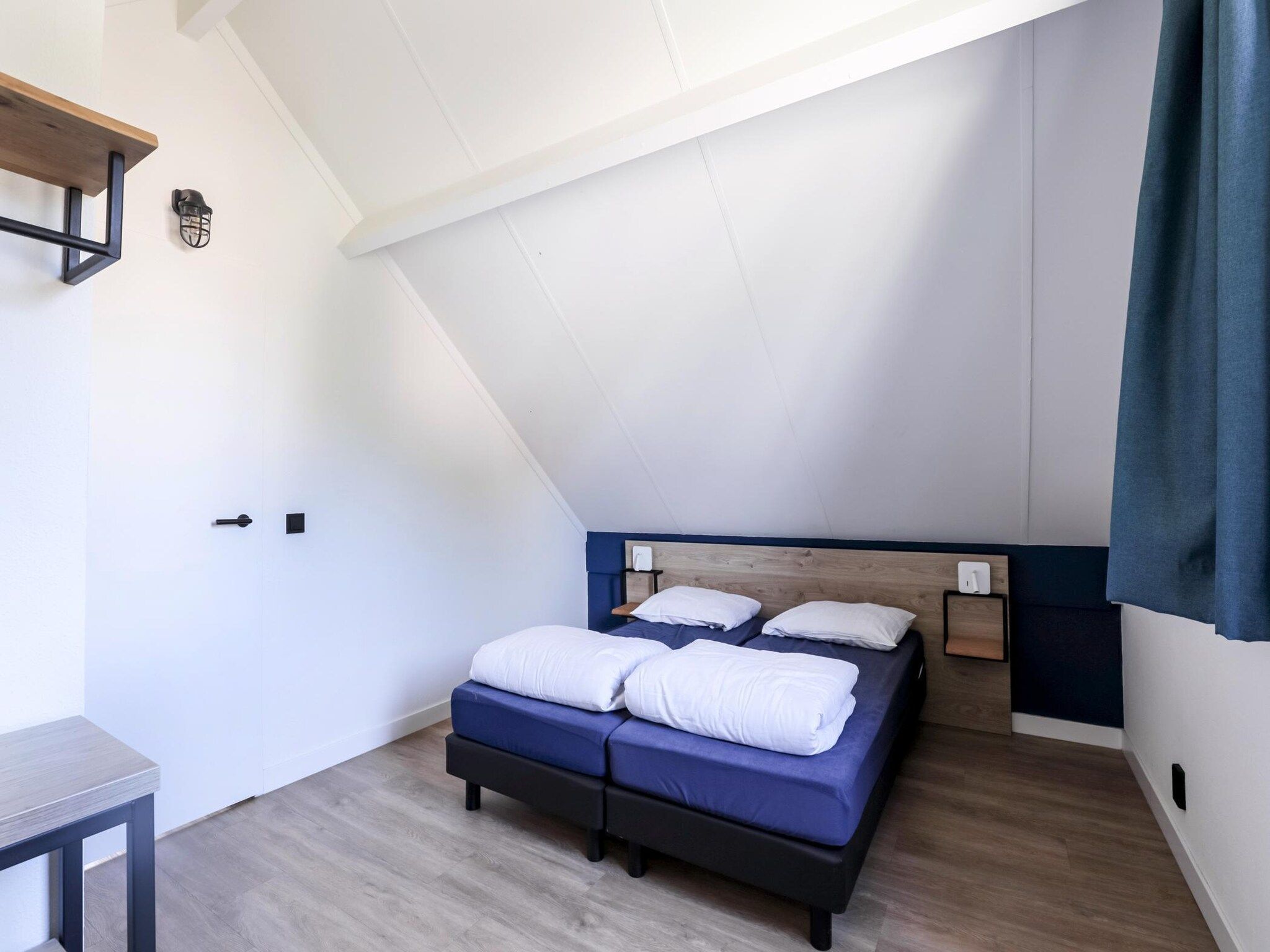 Een slaapkamer van 6 - Persons De Zingende Wilg (copy) (copy) in Ewijk