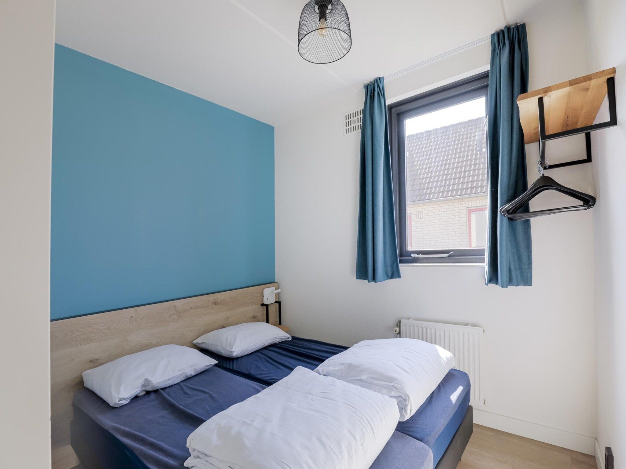 Een slaapkamer van 6 - Persons De Zingende Wilg (copy) (copy) in Ewijk