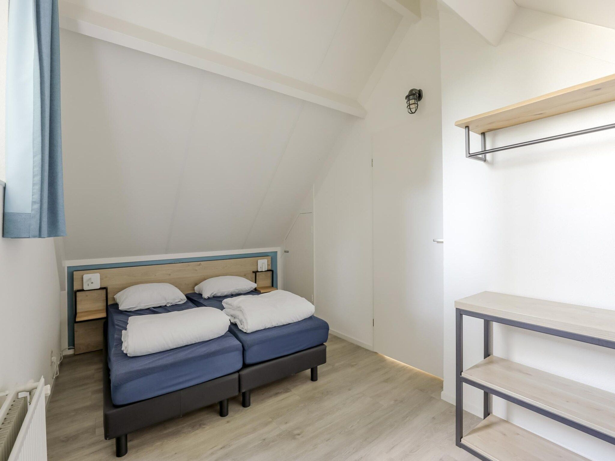 Een slaapkamer van 7 - Persoons Forest 217 Sauna Bungalow (copy) (copy) in Ewijk