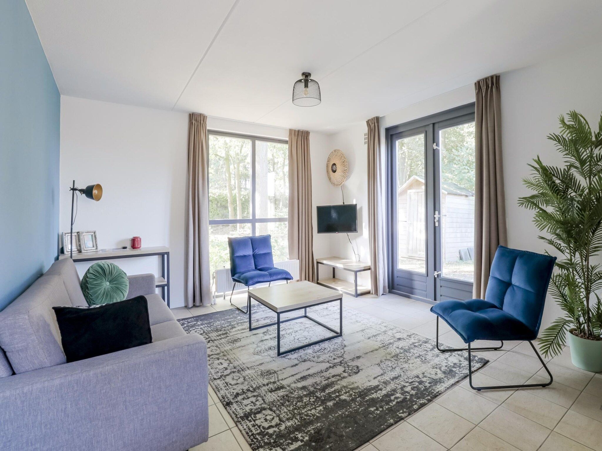 De woonkamer van 7 - Persoons Forest 217 Sauna Bungalow (copy) (copy) in Ewijk