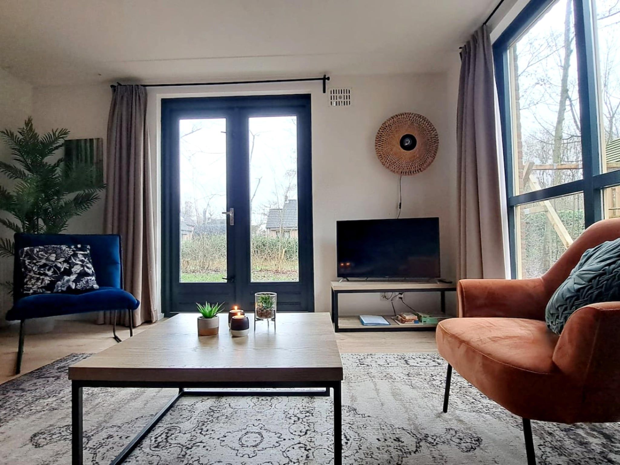 De woonkamer van 7 - Persoons Forest 217 Sauna Bungalow (copy) (copy) (copy) in Ewijk