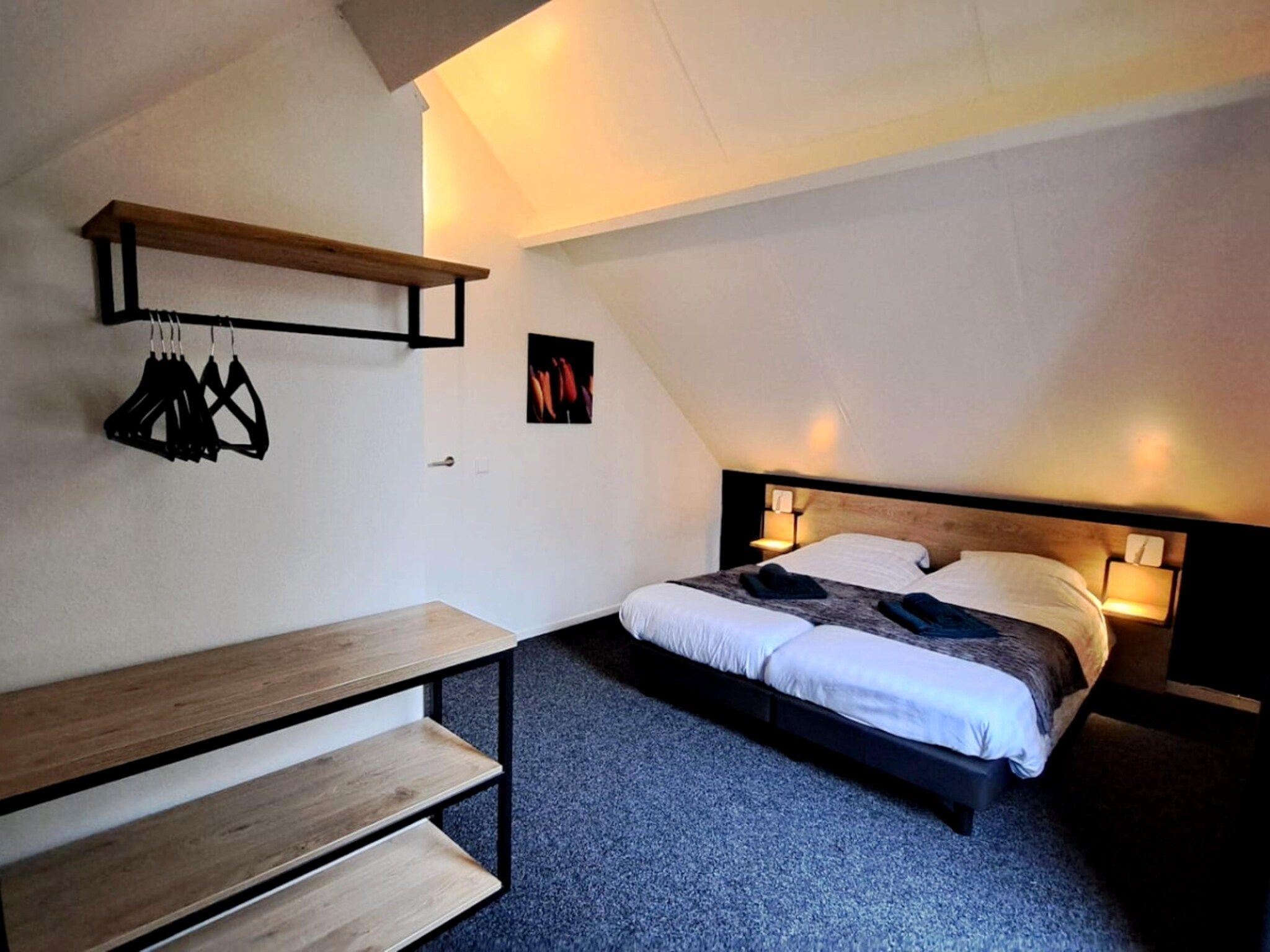 Een slaapkamer van 7 - Persoons Forest 217 Sauna Bungalow (copy) (copy) (copy) in Ewijk