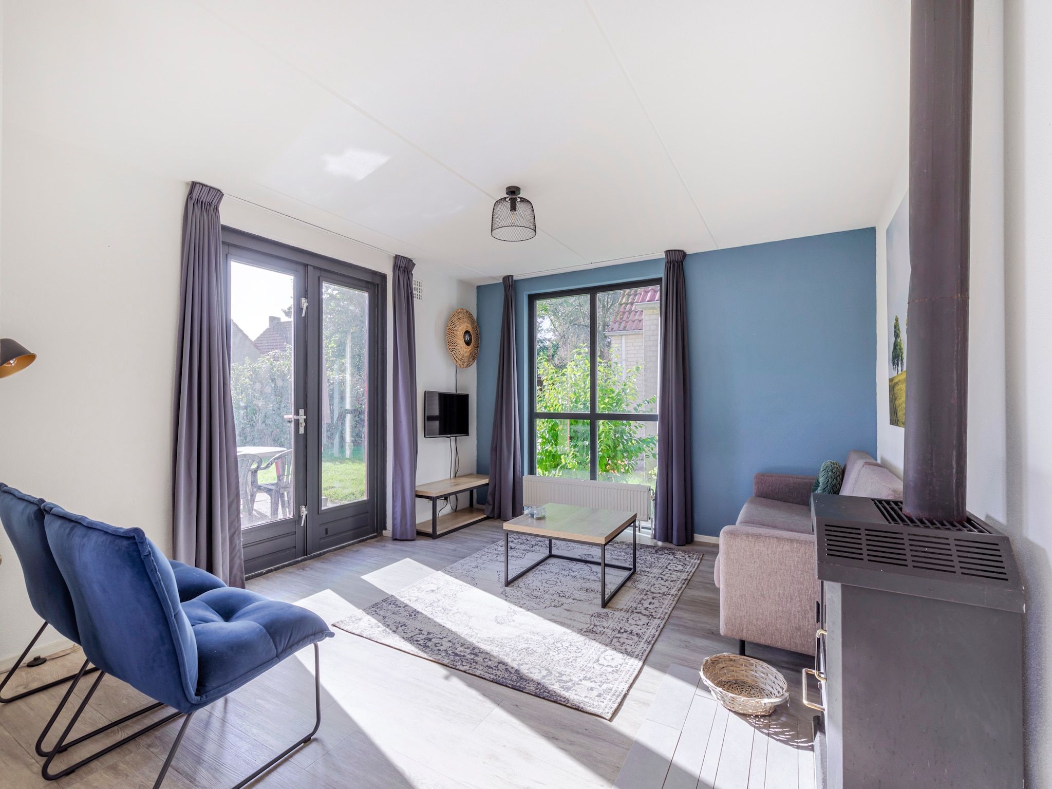 De woonkamer van 7 - Persoons Forest 217 Sauna Bungalow (copy) (copy) (copy) in Ewijk