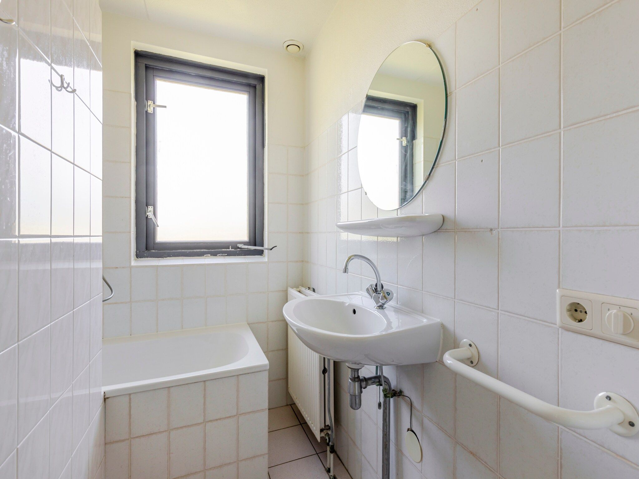 De badkamer van 7 - Persoons Forest 217 Sauna Bungalow (copy) (copy) (copy) in Ewijk