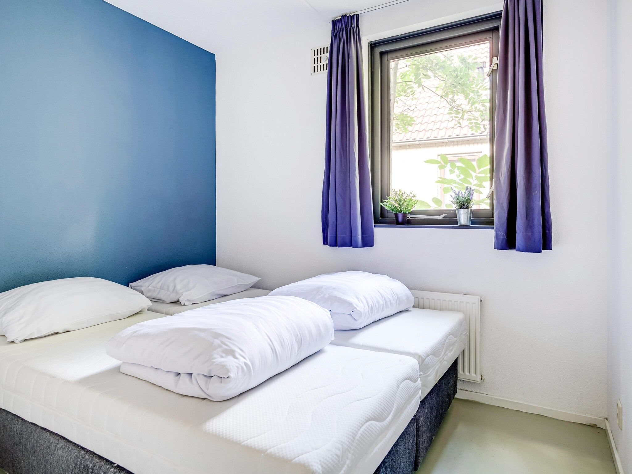 Een slaapkamer van 6 - Persons De Zingende Wilg (copy) (copy) (copy) in Ewijk