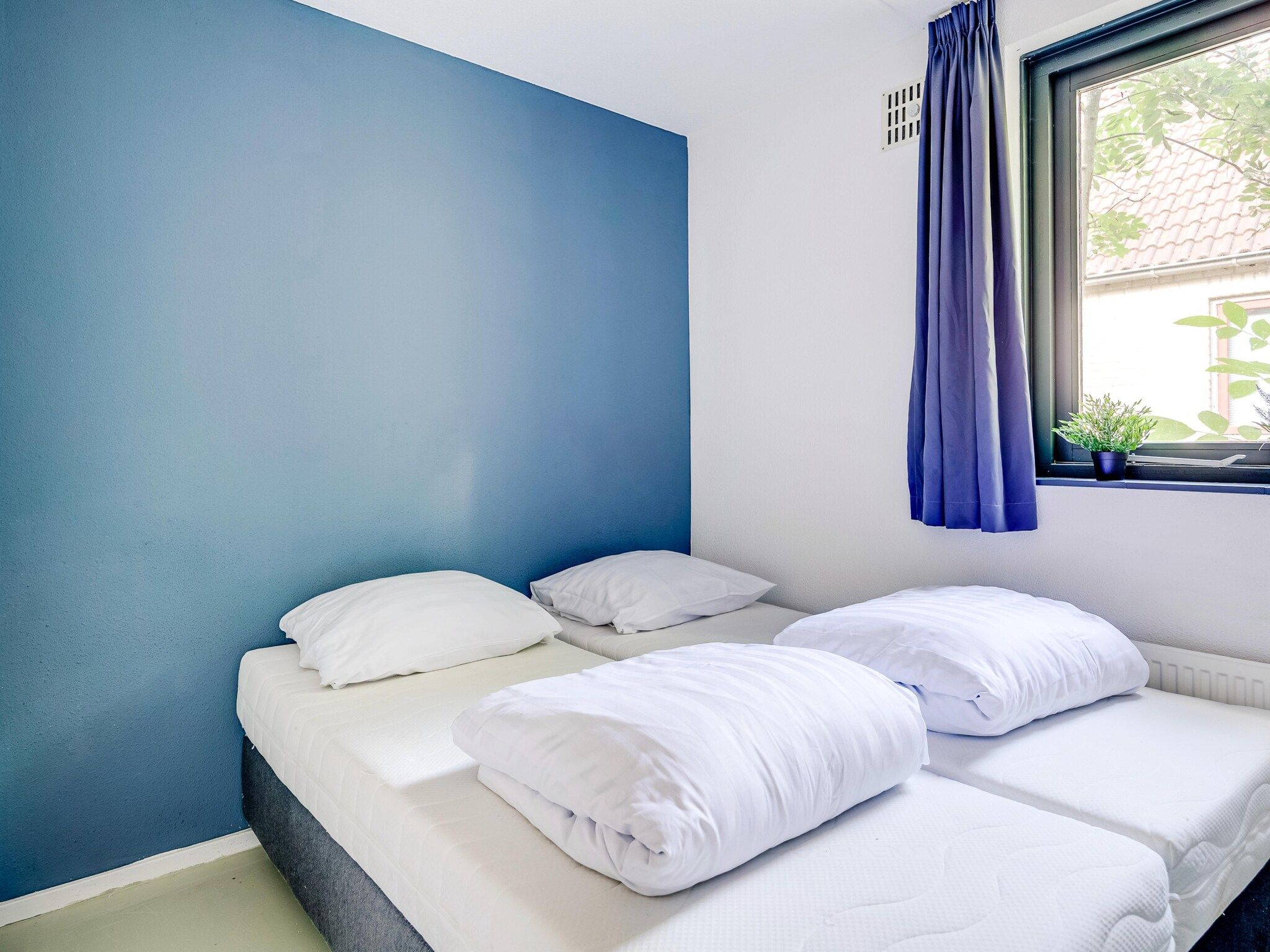 Een slaapkamer van 6 - Persons De Zingende Wilg (copy) (copy) (copy) in Ewijk