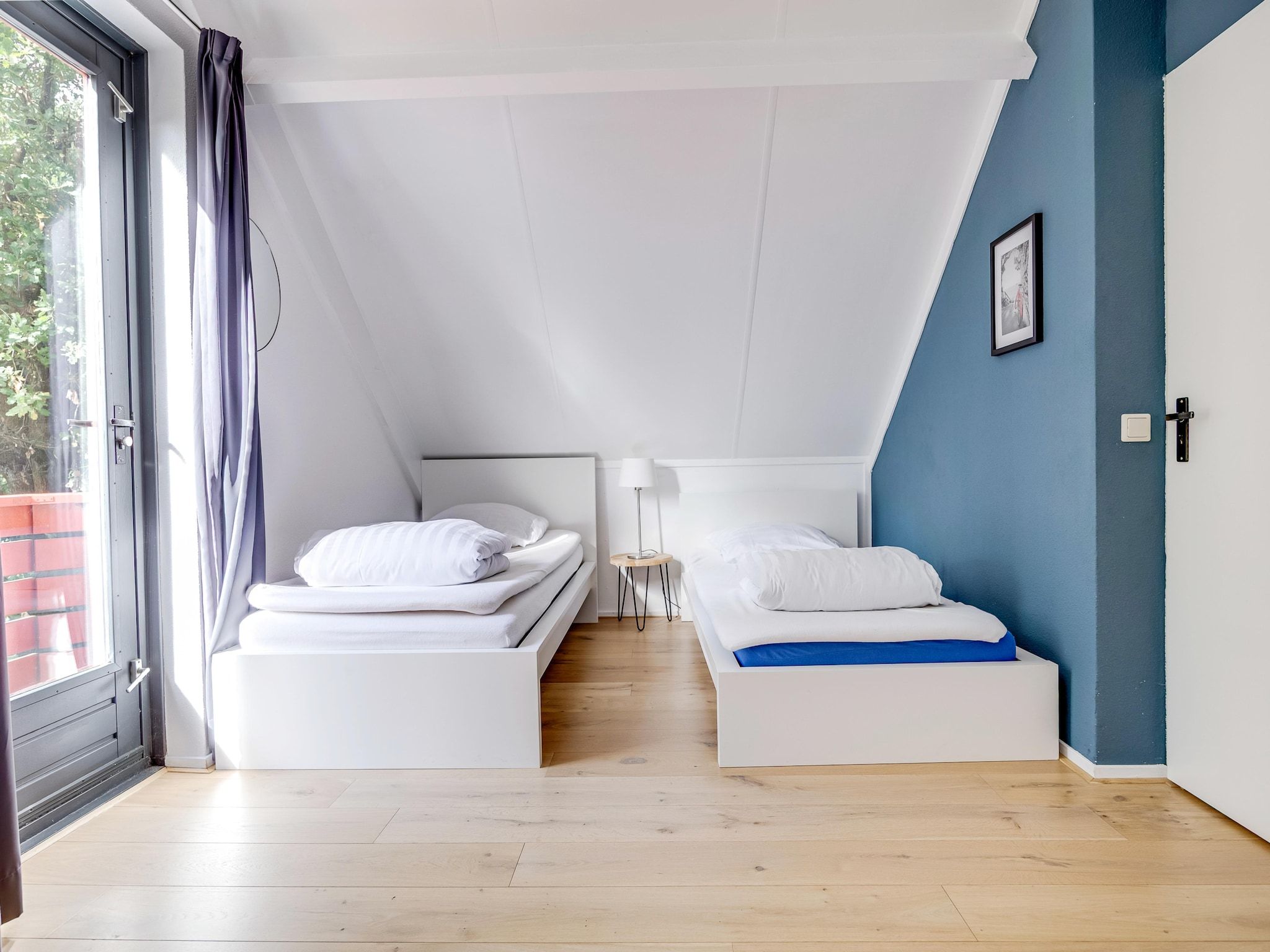 Een slaapkamer van 6 - Persons De Zingende Wilg (copy) (copy) (copy) in Ewijk