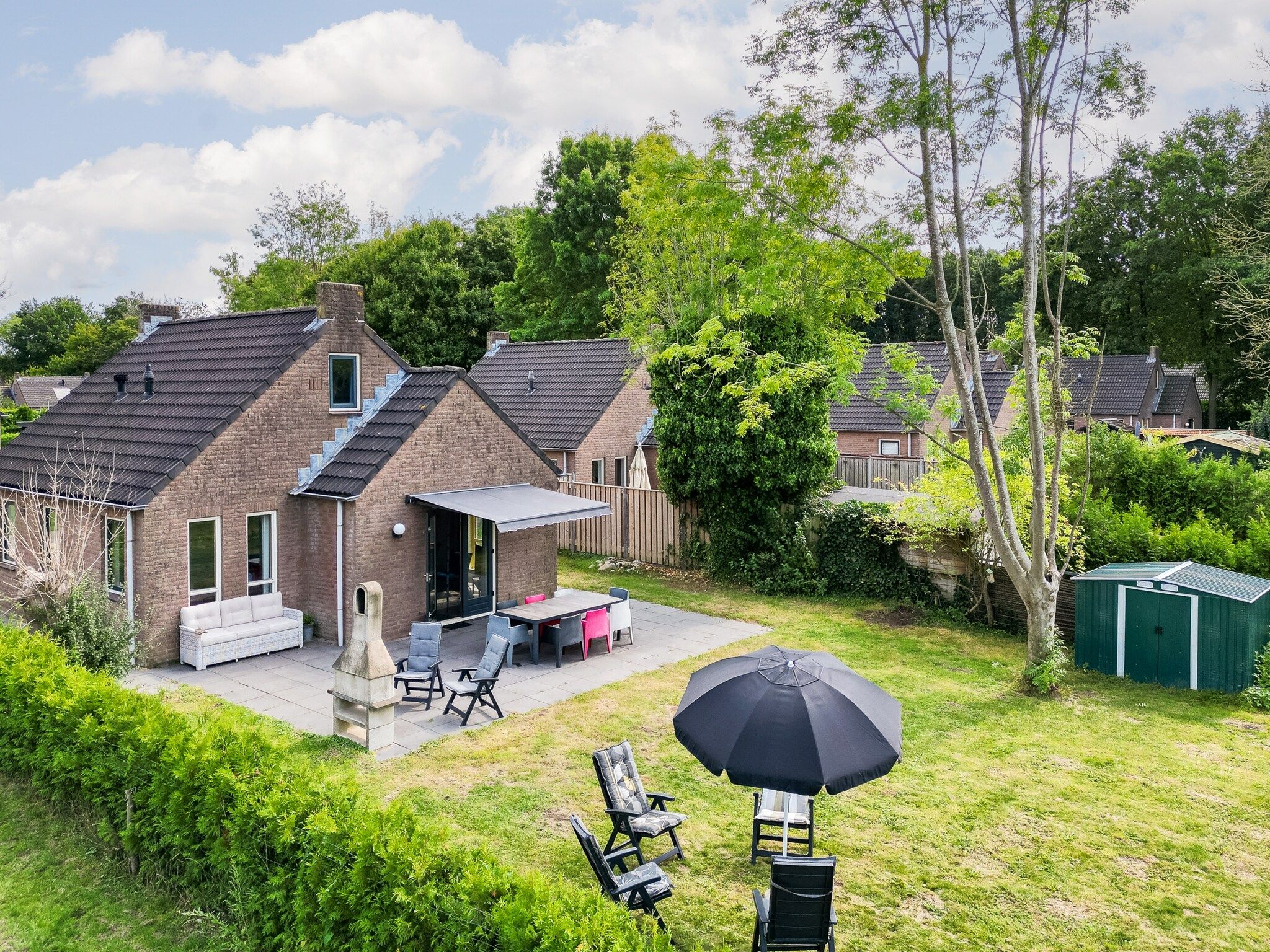 De buitenkant van 7 - Persoons Forest 217 Sauna Bungalow (copy) (copy) (copy) in Ewijk