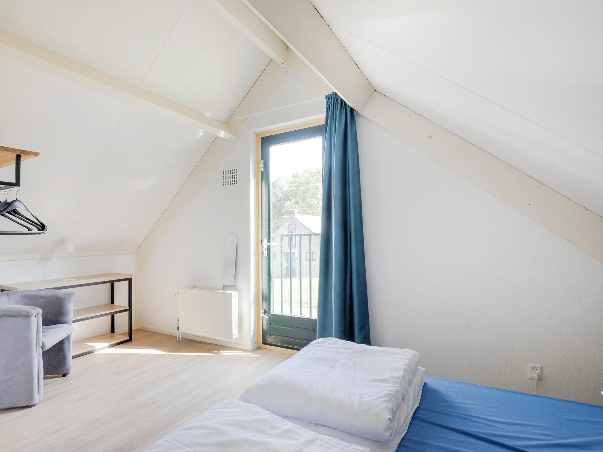 Een slaapkamer van 7 - Persoons Forest 217 Sauna Bungalow (copy) (copy) (copy) in Ewijk