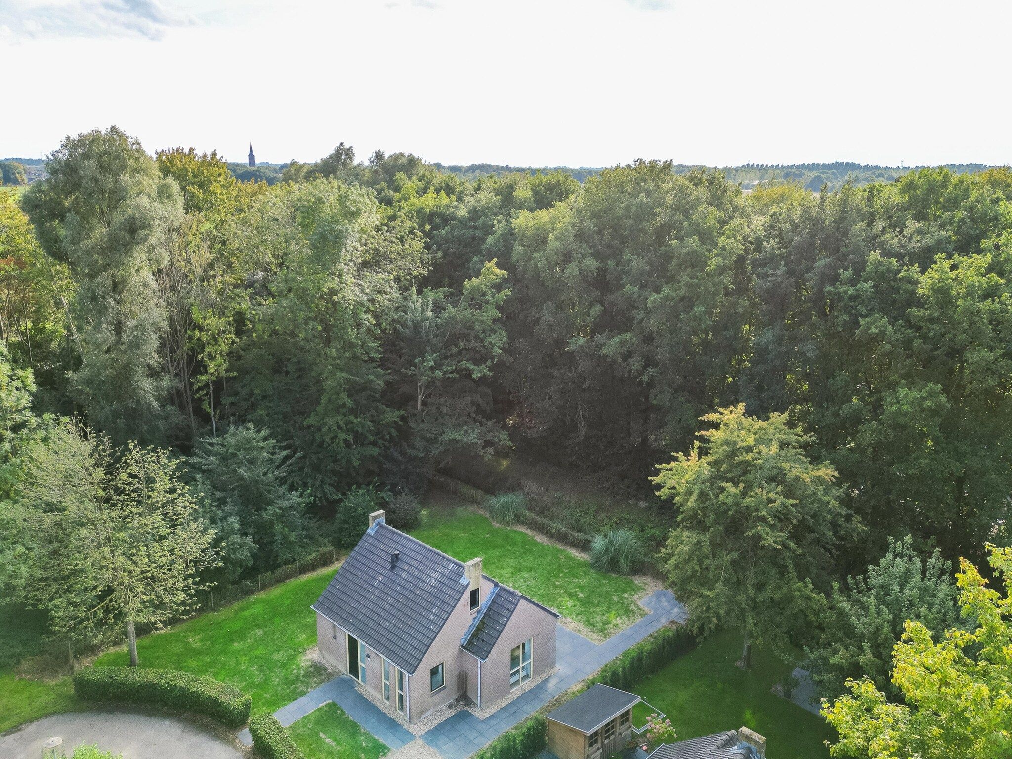 De buitenkant van 7 - Persoons Forest 217 Sauna Bungalow (copy) (copy) (copy) in Ewijk