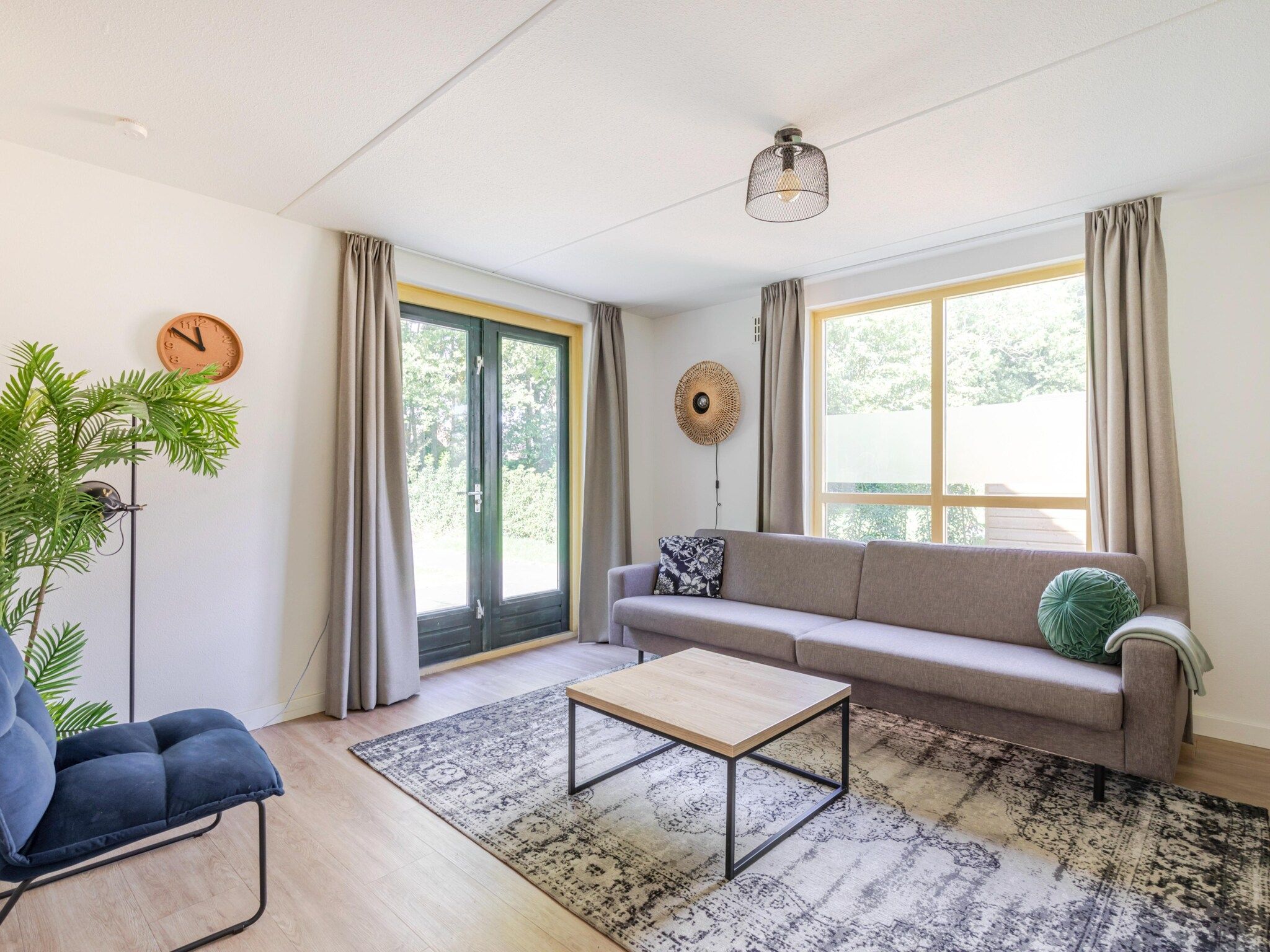 De woonkamer van 7 - Persoons Forest 217 Sauna Bungalow (copy) (copy) (copy) in Ewijk