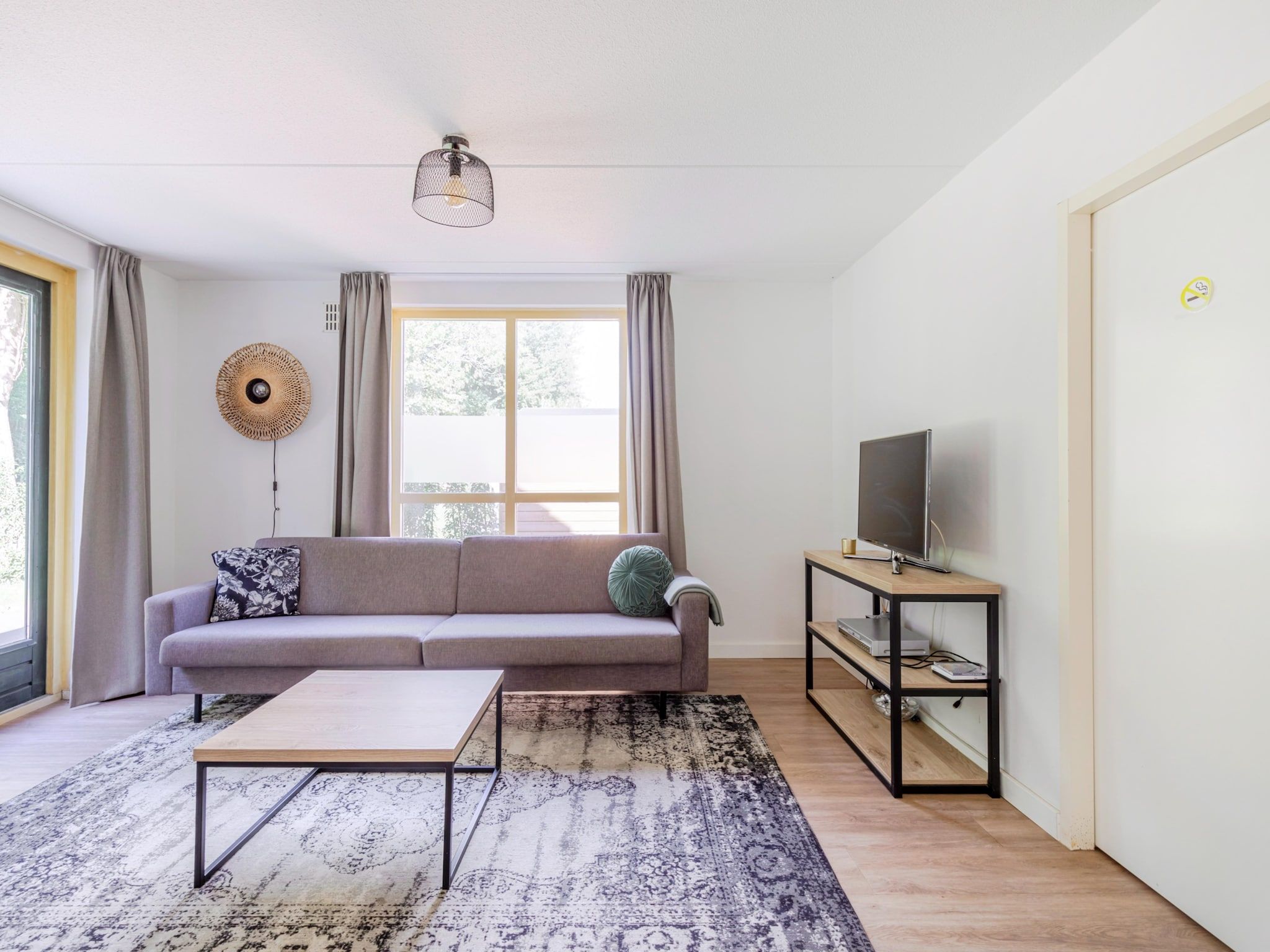 De woonkamer van 7 - Persoons Forest 217 Sauna Bungalow (copy) (copy) (copy) in Ewijk