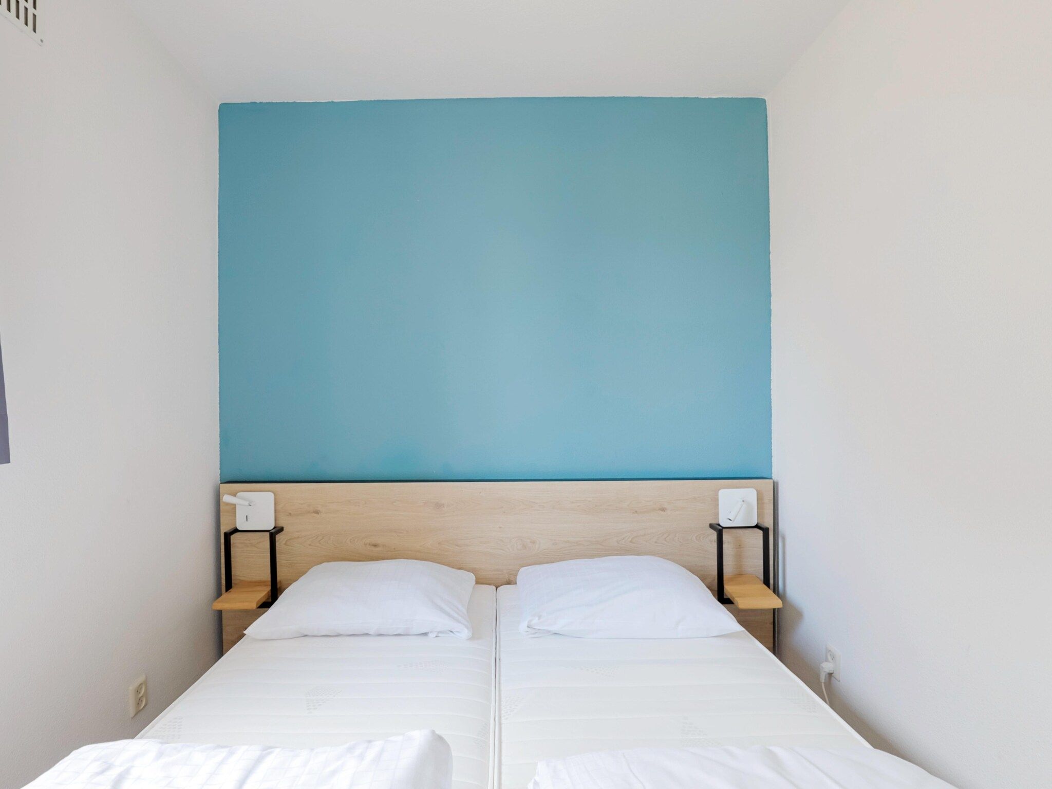 Een slaapkamer van 7 - Persoons Forest 217 Sauna Bungalow (copy) (copy) (copy) in Ewijk