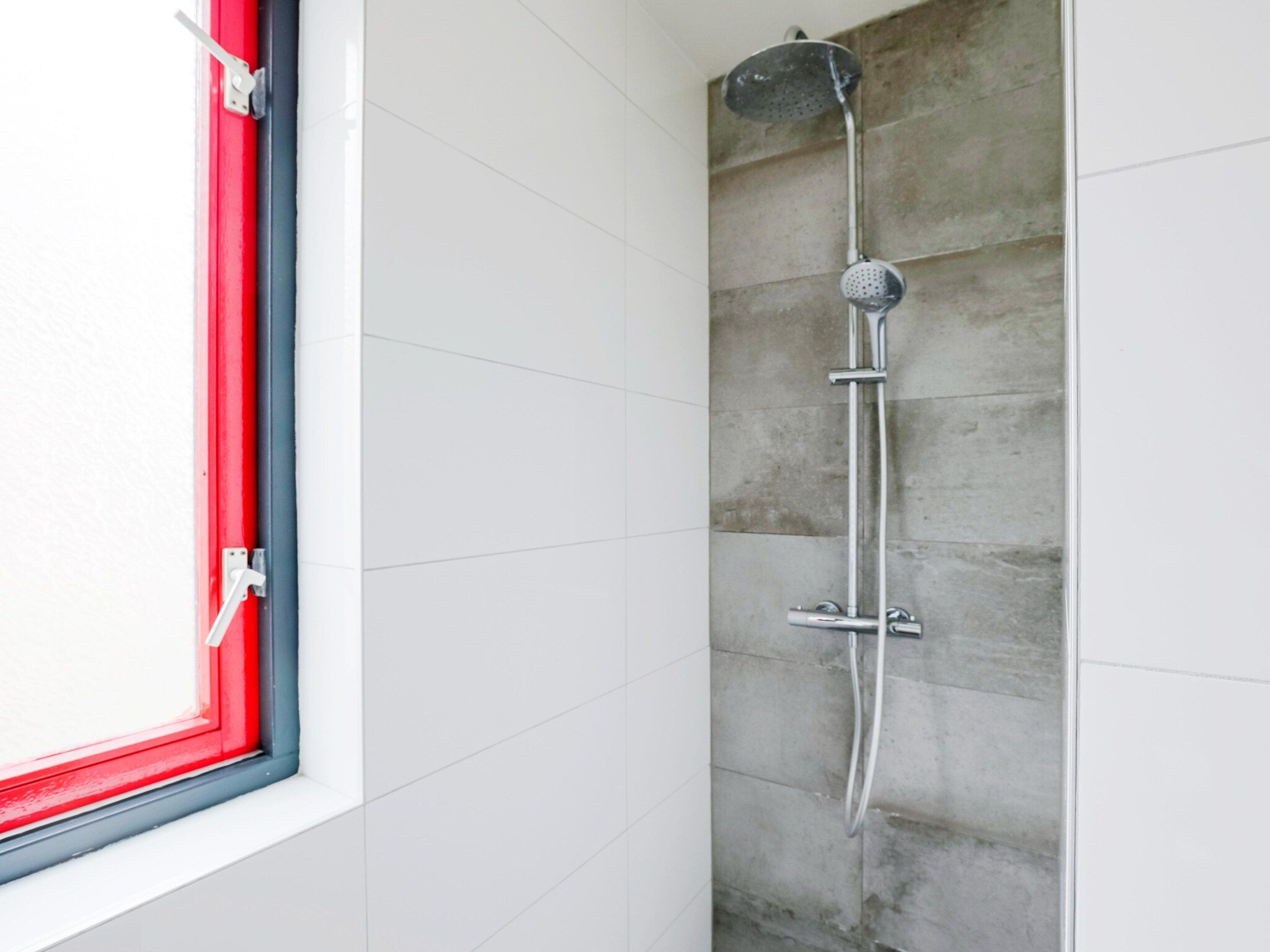 De badkamer van 7 - Persoons Forest 217 Sauna Bungalow (copy) (copy) (copy) in Ewijk