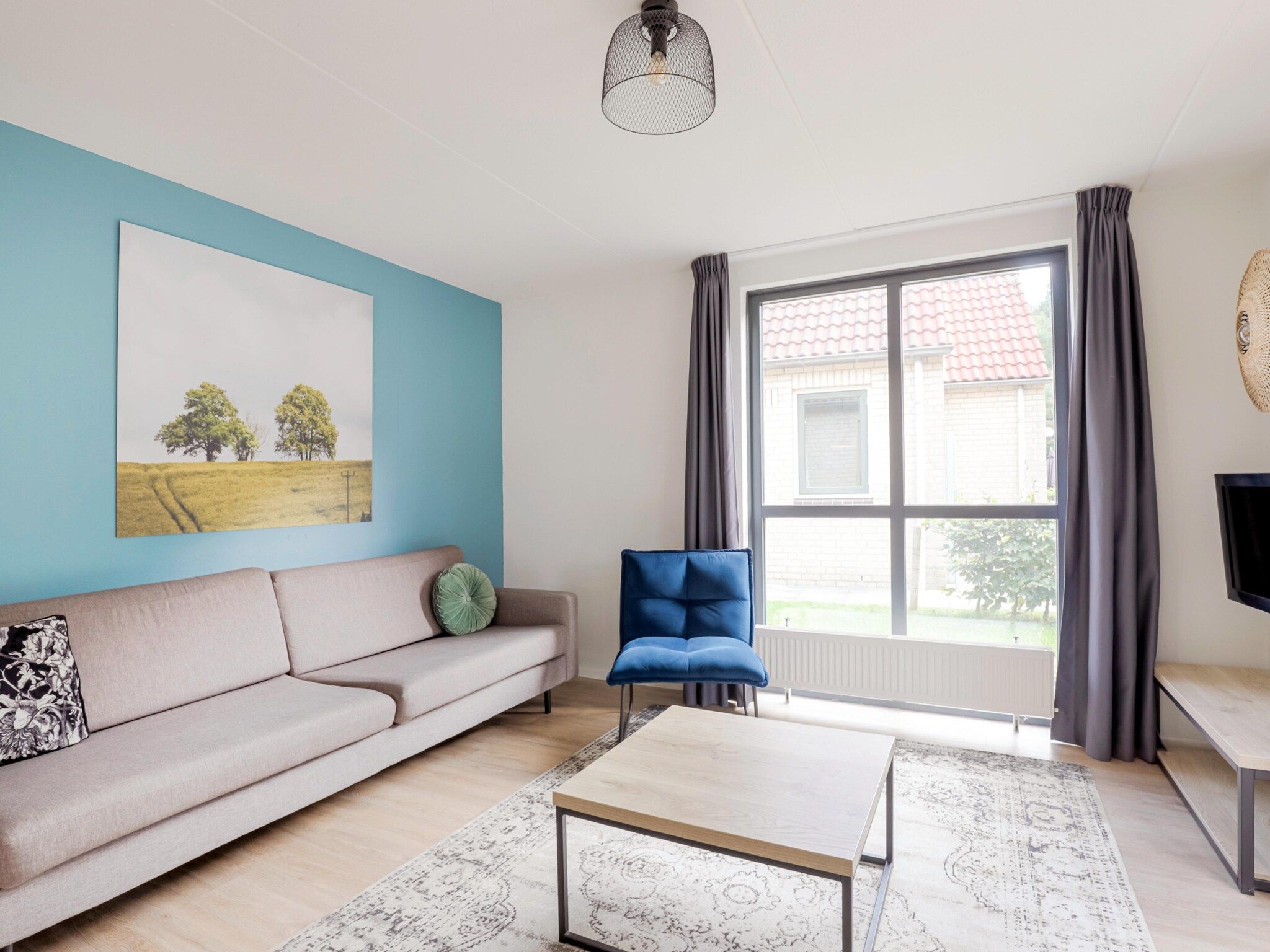 De woonkamer van 7 - Persoons Forest 217 Sauna Bungalow (copy) (copy) (copy) in Ewijk