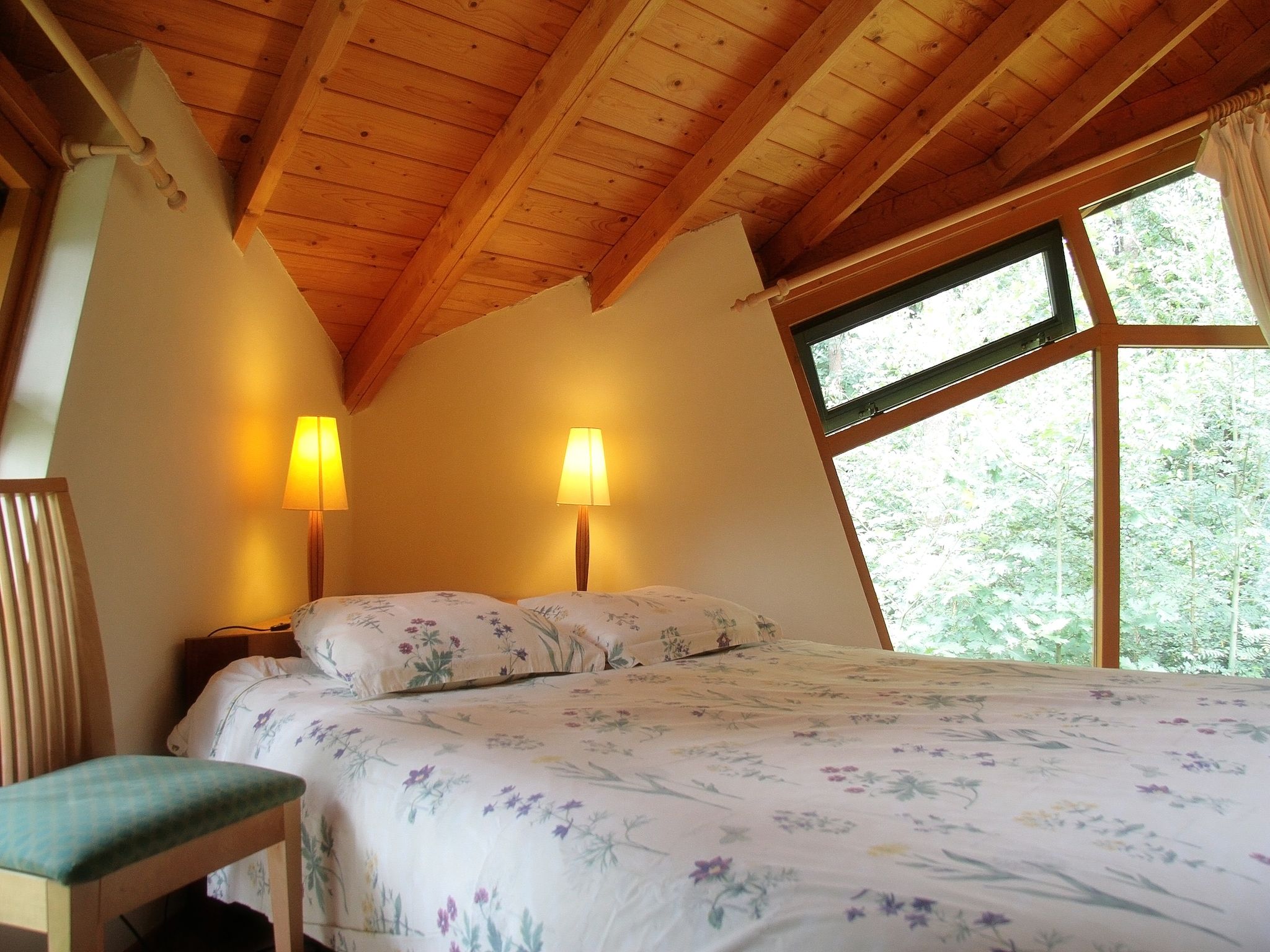 Een slaapkamer van Vakantiepark Herperduin 9 in Herpen