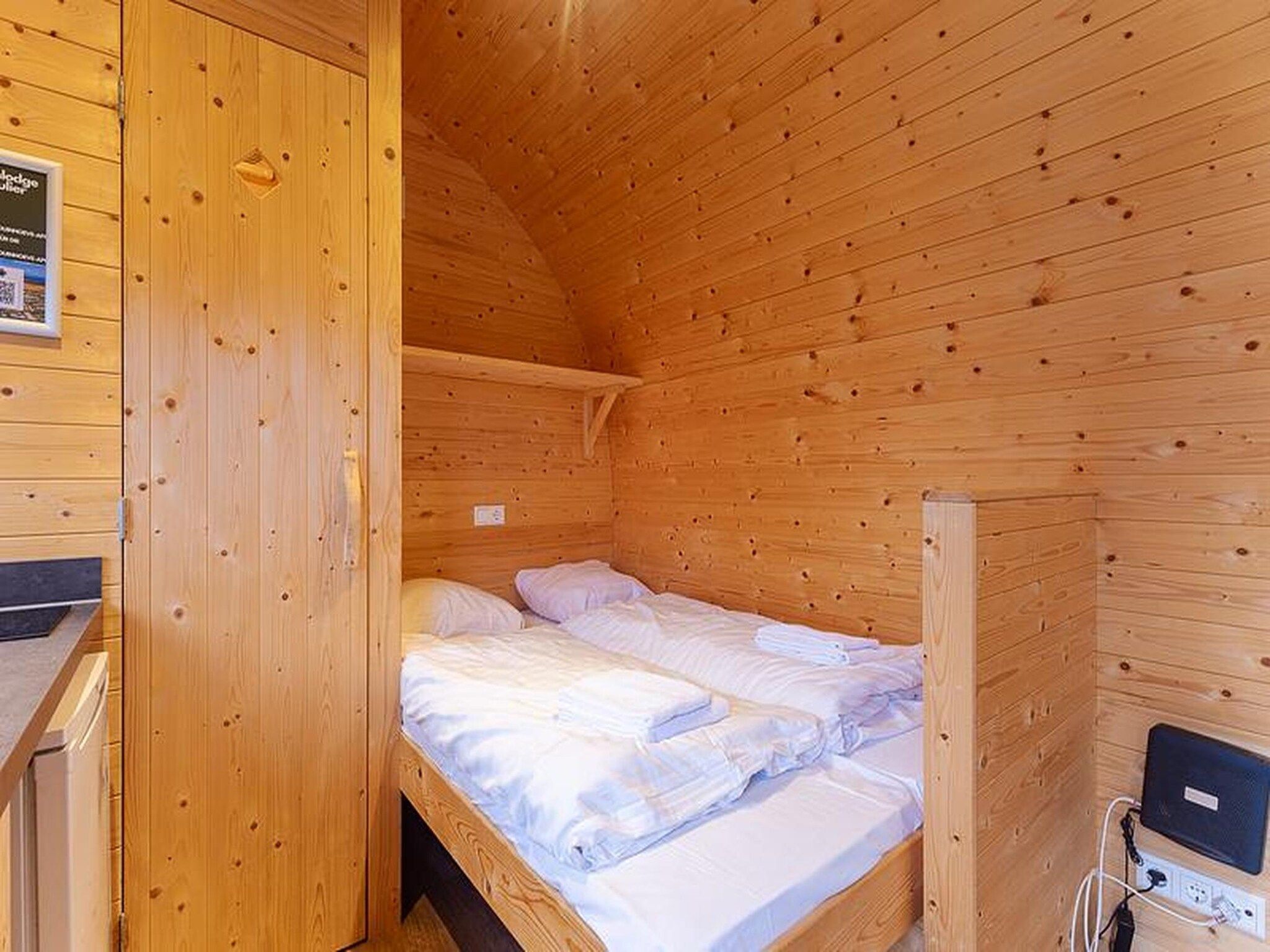 Een slaapkamer van Duinhoeve Duinlodges 4pers (huisdiervriendelijk) in Burgh-Haamstede