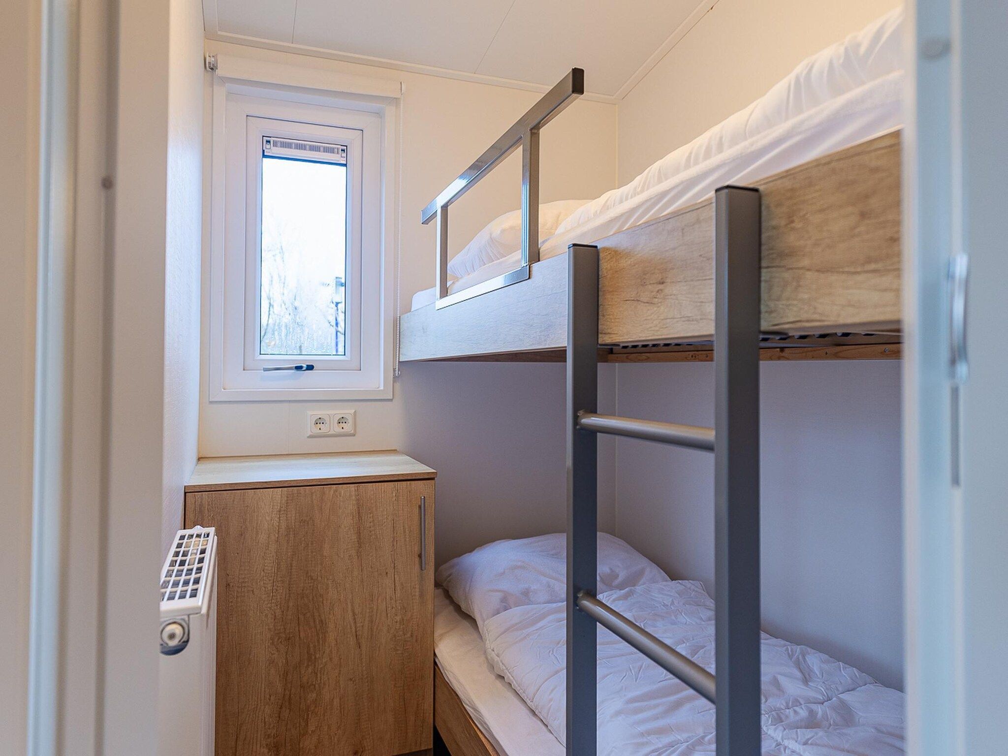 Een slaapkamer van Duinhoeve Chalet Zeeland (huisdier toegestaan) in Burgh-Haamstede