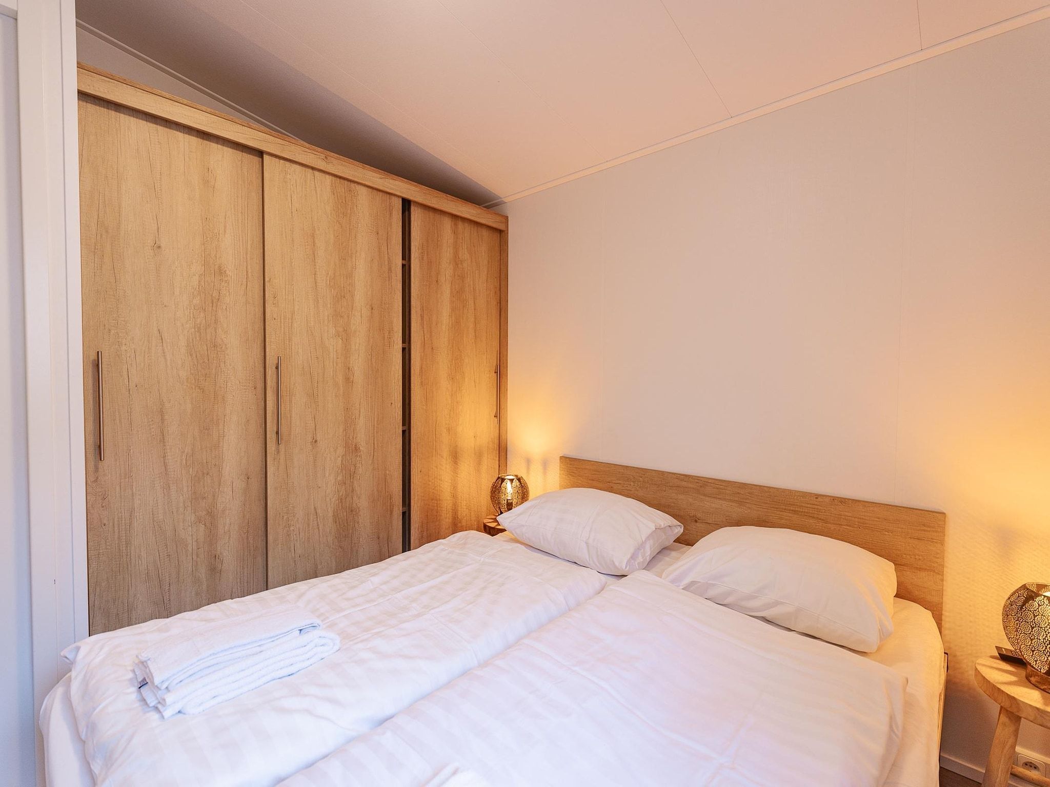 Een slaapkamer van Duinhoeve Chalet Zeeland (huisdier toegestaan) in Burgh-Haamstede