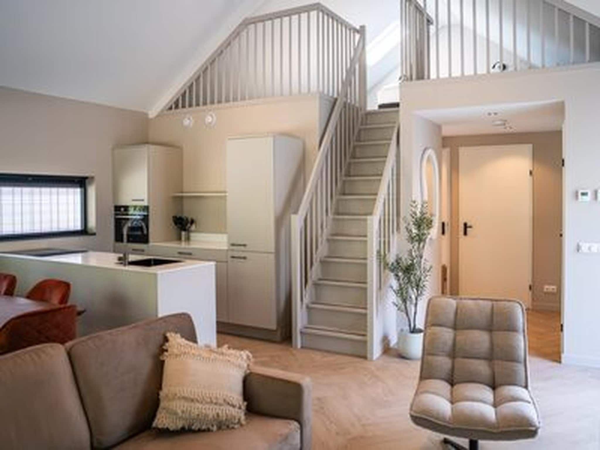 De woonkamer van Ecovilla Boszicht Luxe in Oirschot