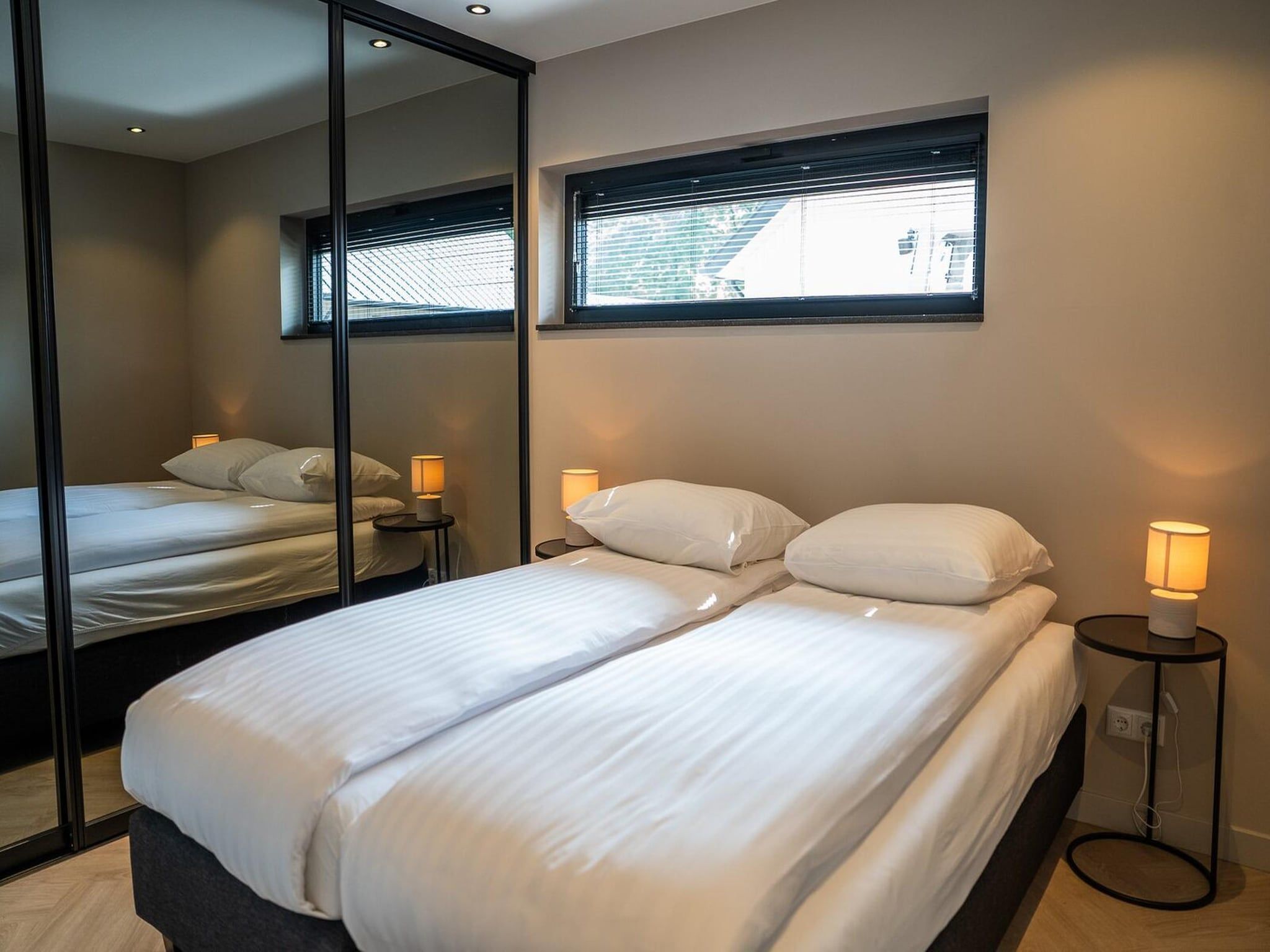 Een slaapkamer van Ecovilla Boszicht Luxe in Oirschot