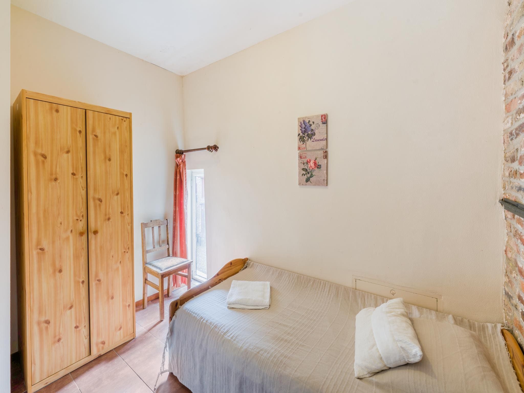 Een slaapkamer van Meschermolen 12 in Mesch-Eijsden