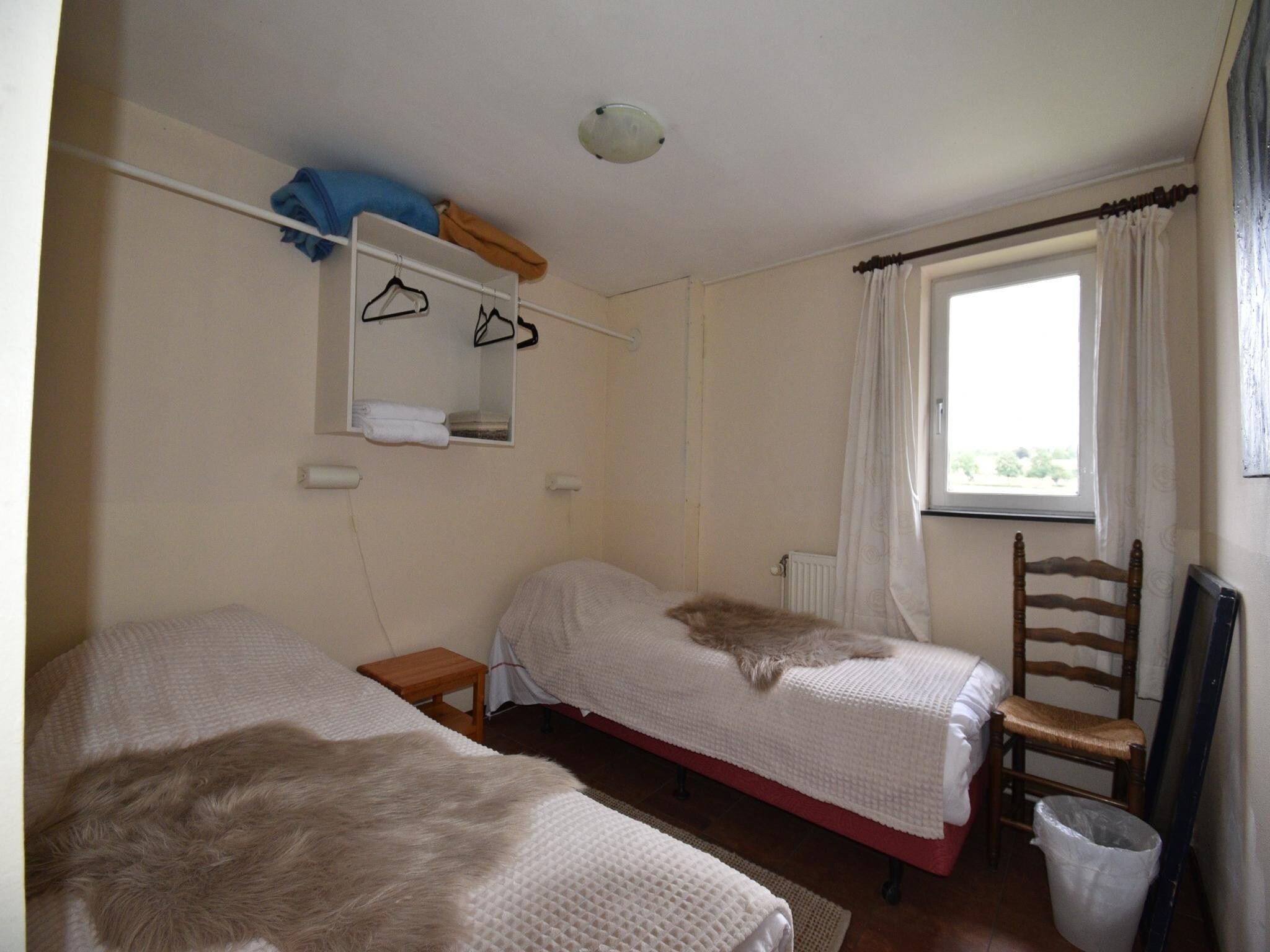 Een slaapkamer van Meschermolen 14 in Mesch-Eijsden