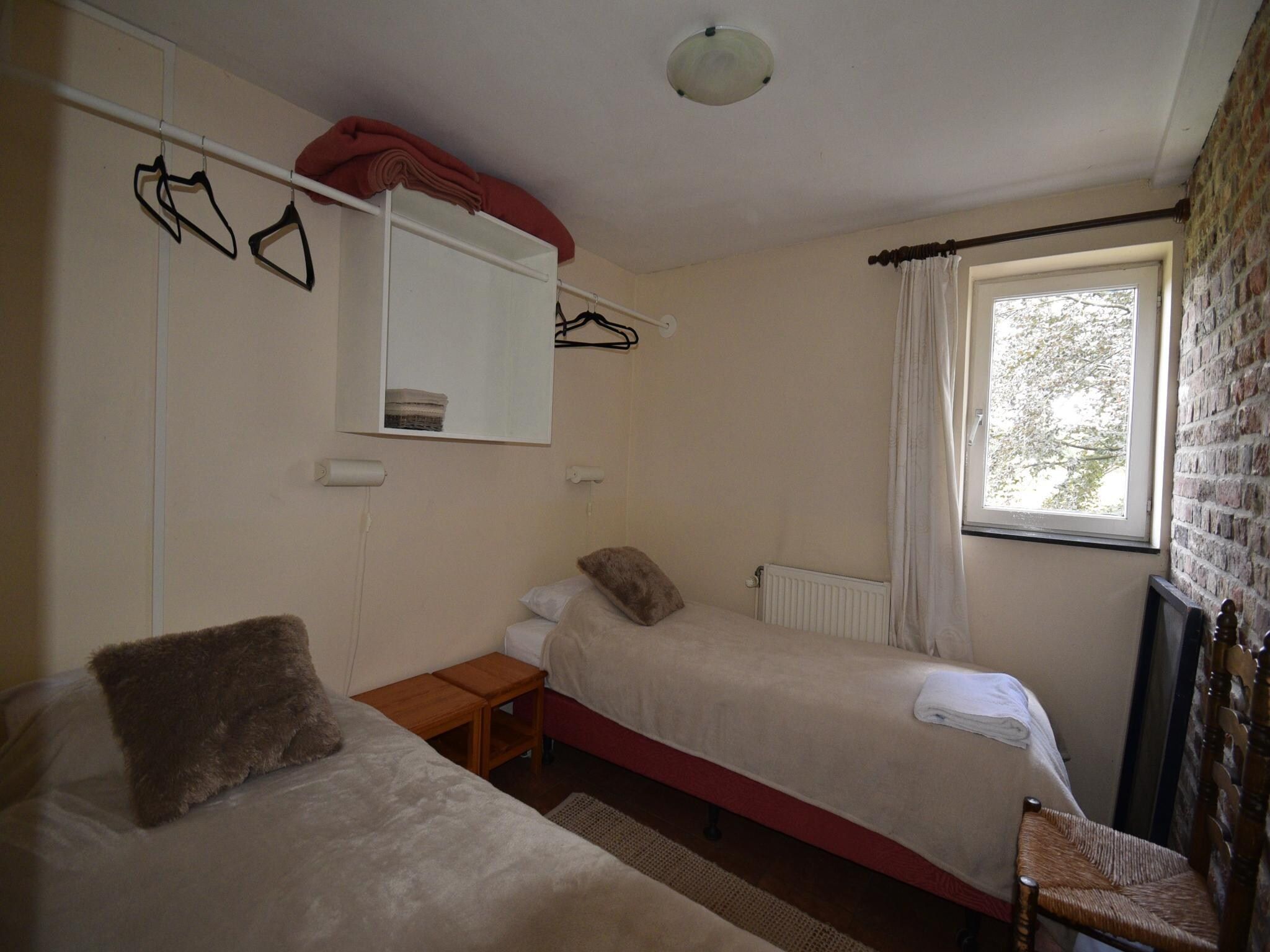 Een slaapkamer van Meschermolen 14 in Mesch-Eijsden