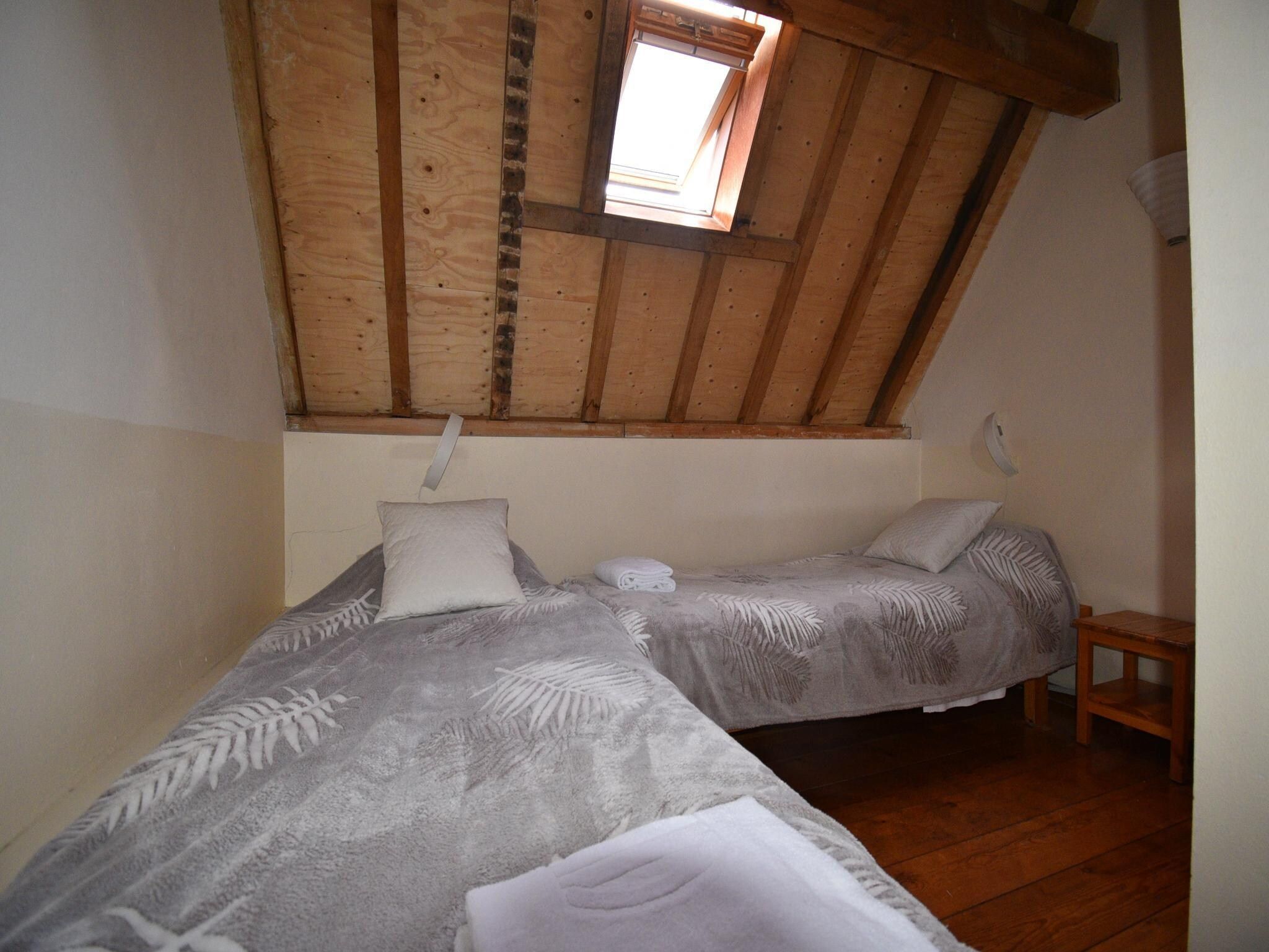 Een slaapkamer van Meschermolen 14 in Mesch-Eijsden