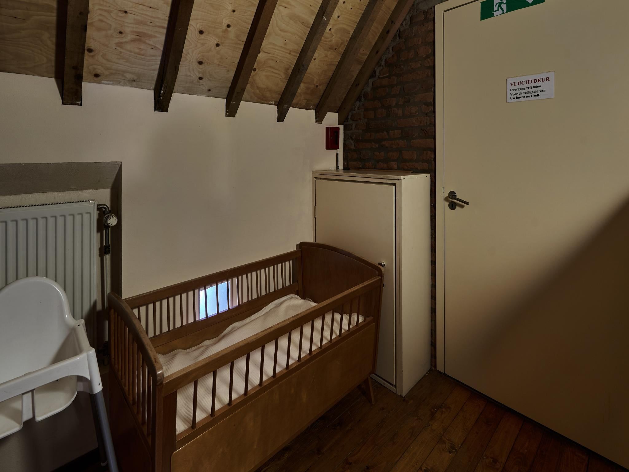 Een slaapkamer van Meschermolen 3 in Mesch-Eijsden